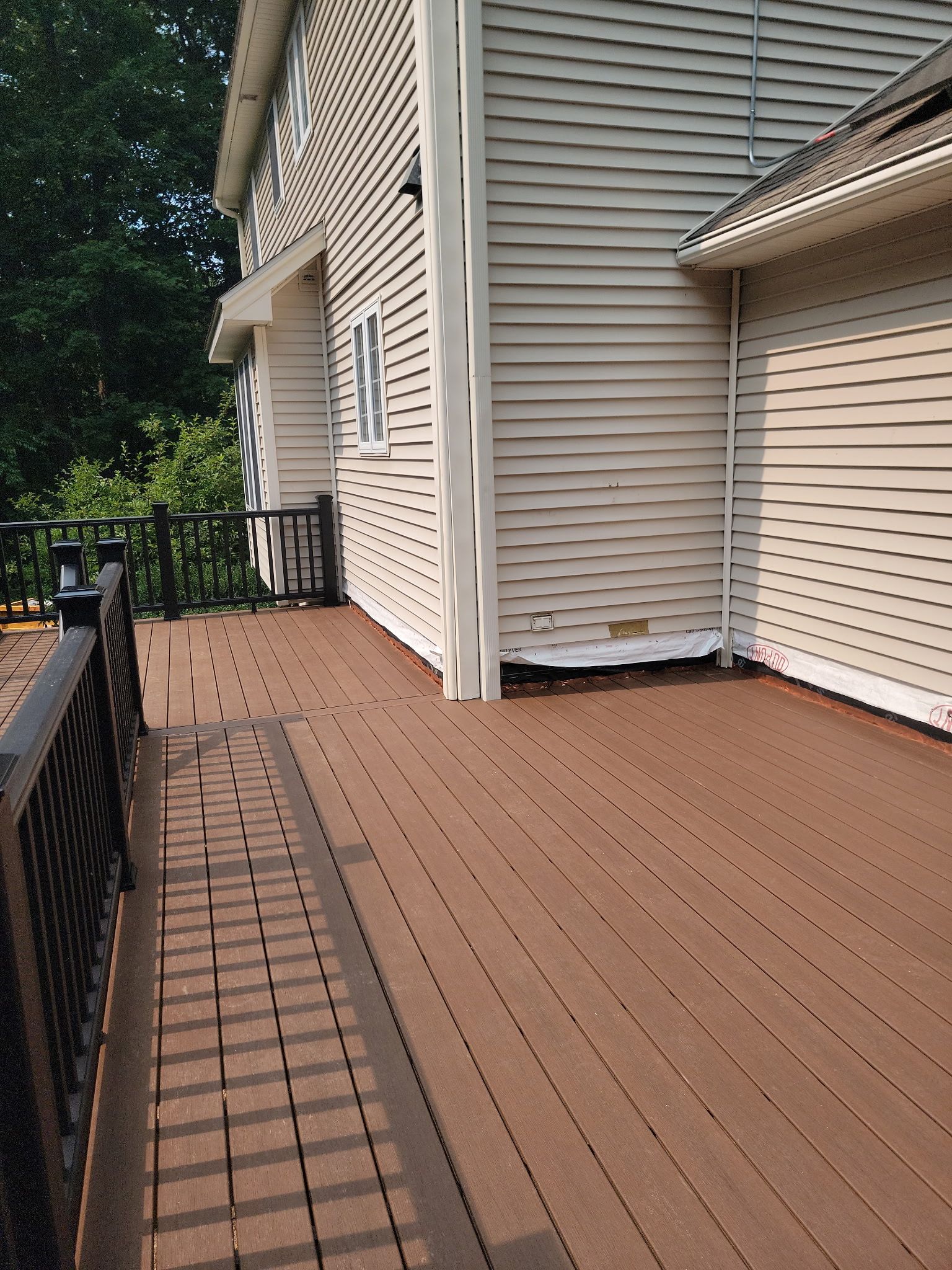 Deck Replacement, using Trex Select Whiskey Barrel and Transcend Railings in Black. by DiGiorgi Roofing and Siding Inc