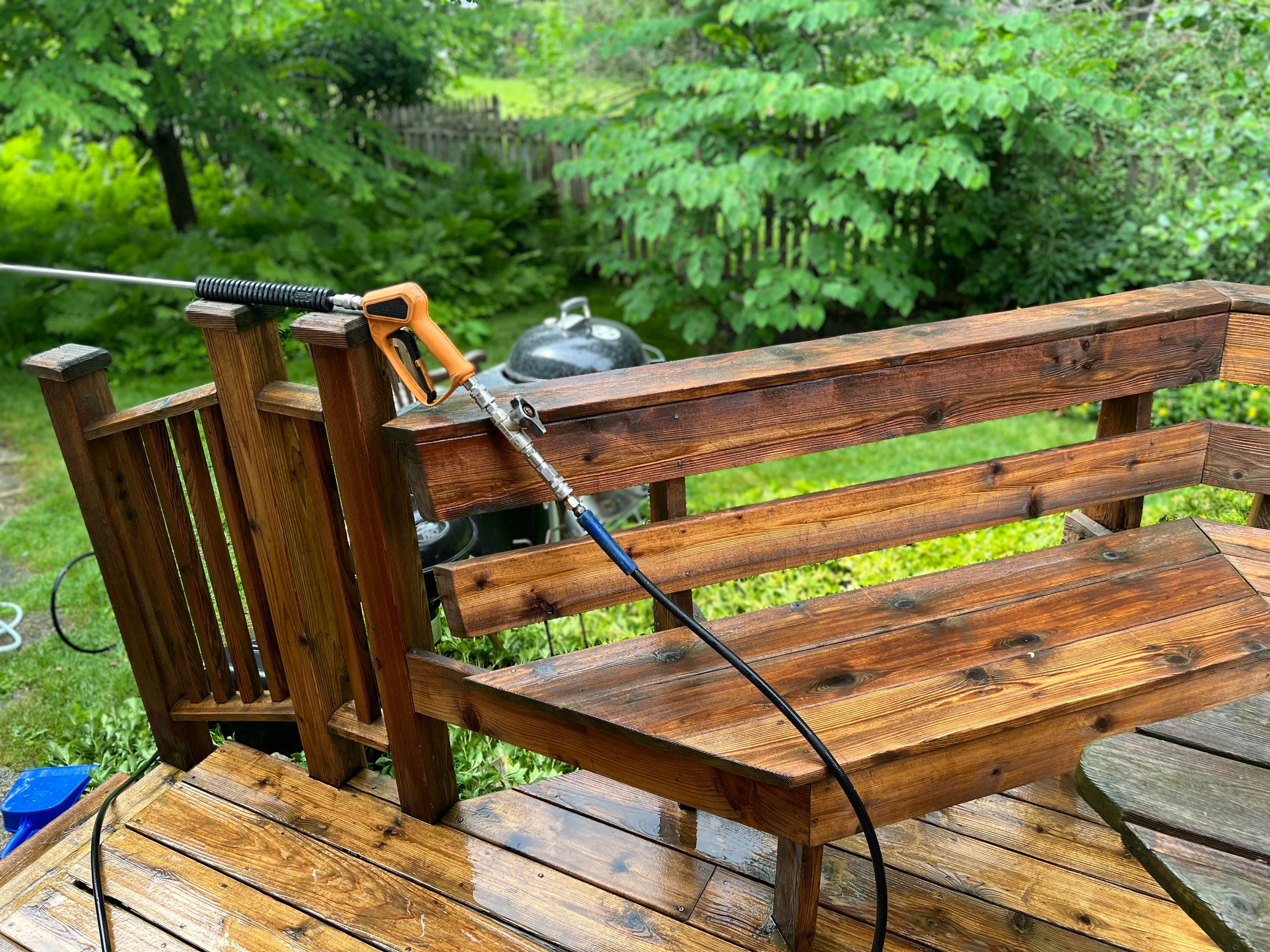 Wood deck cleaning, board replacement and staining by Northern Power Washing LLC.