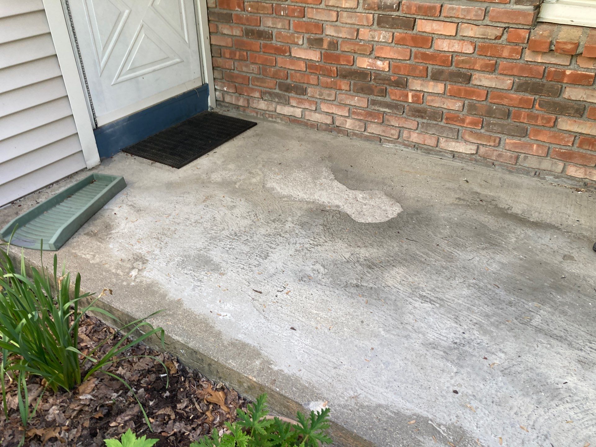 Concrete Floor Coating Transformation by DiGiorgi Roofing and Siding Inc