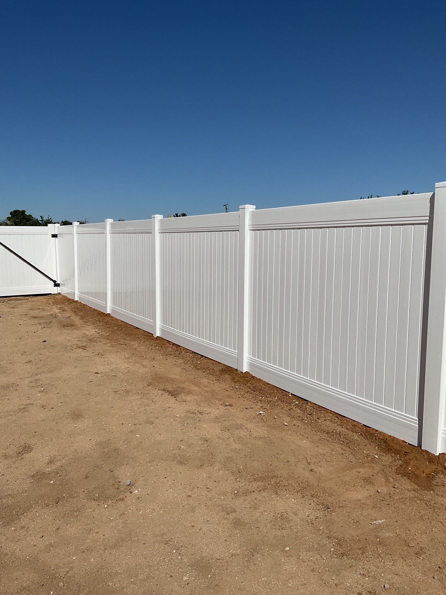 6ft White Privacy Vinyl Fence with Chain-link Fence by Fence Guys Inc.