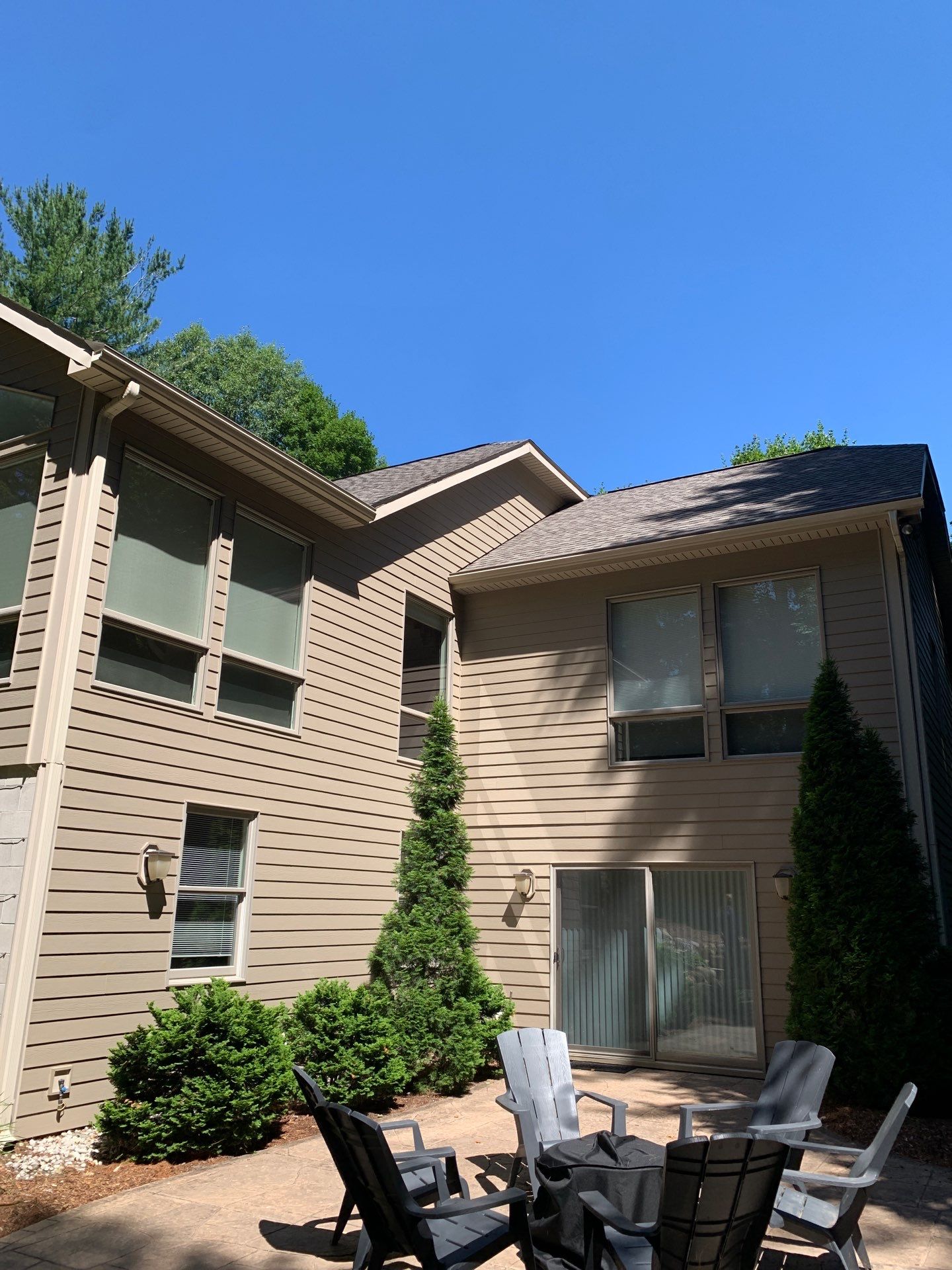 Gutter Helmet Installation on a Multi-Level Traverse City Residence by Rainbow Seamless Systems