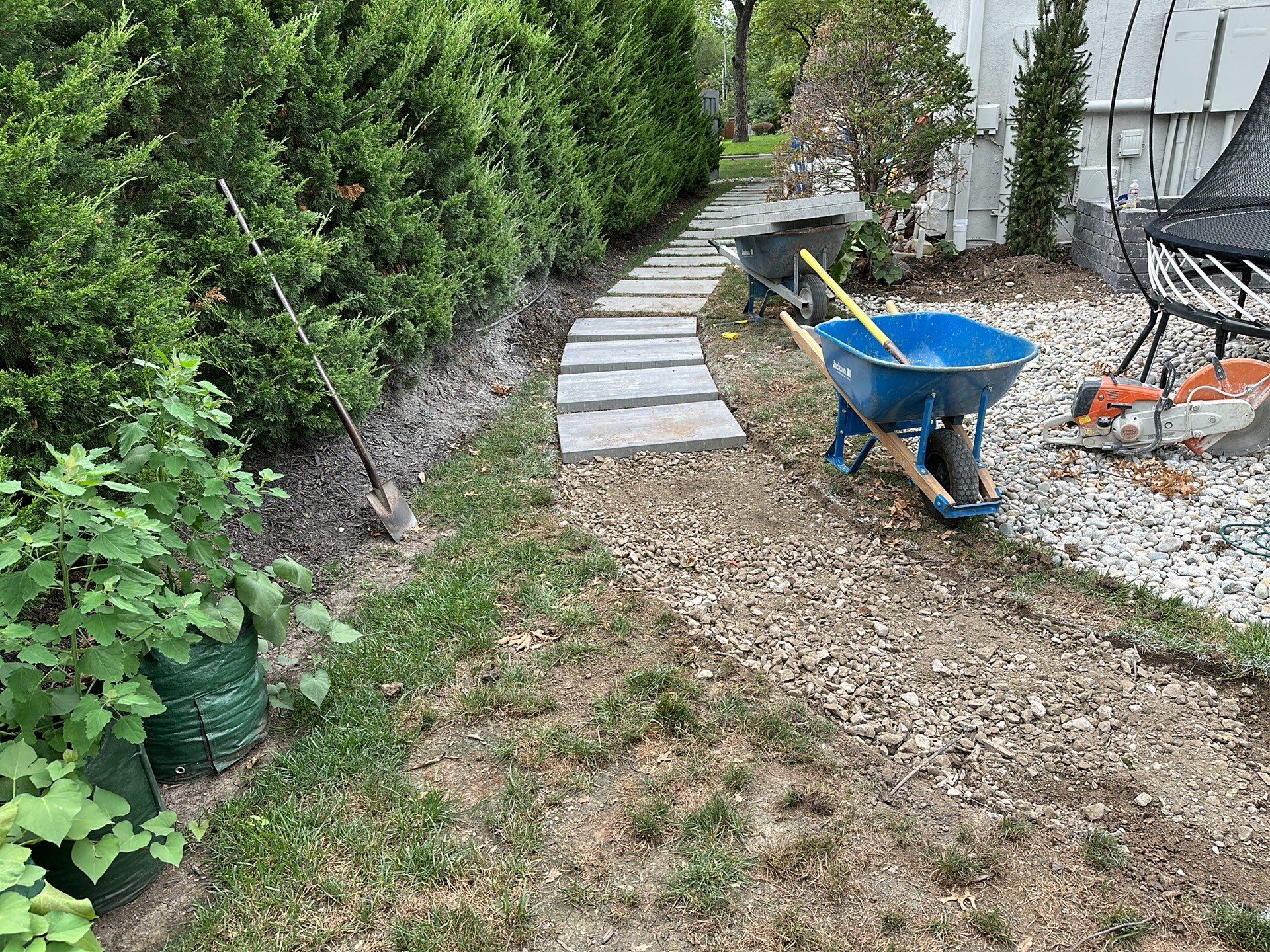 Back Yard Pool Sidewalk and Landscape by LAND ESCAPES LLC