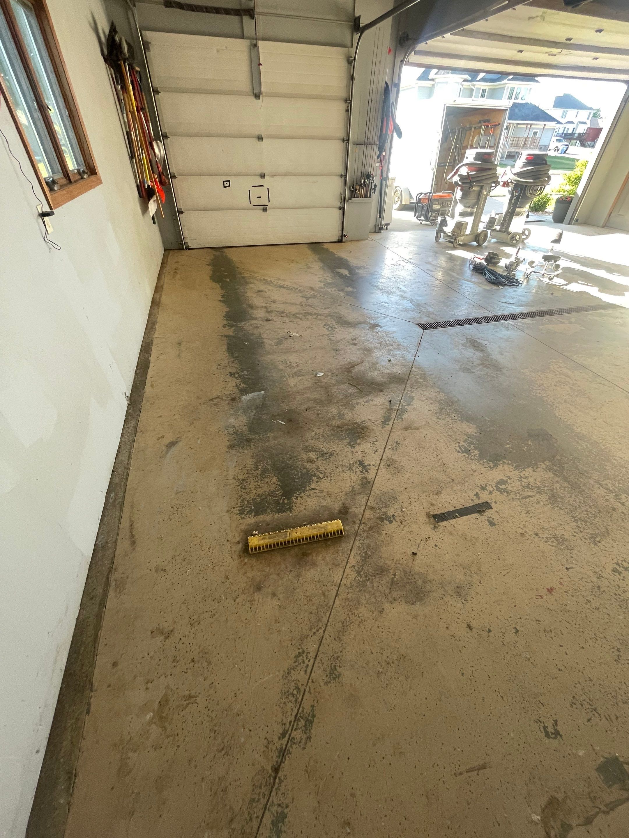 Full Garage Floor Epoxy Coating Installation in Dell Rapids by Select Painting, Coatings & Garage Cabinets