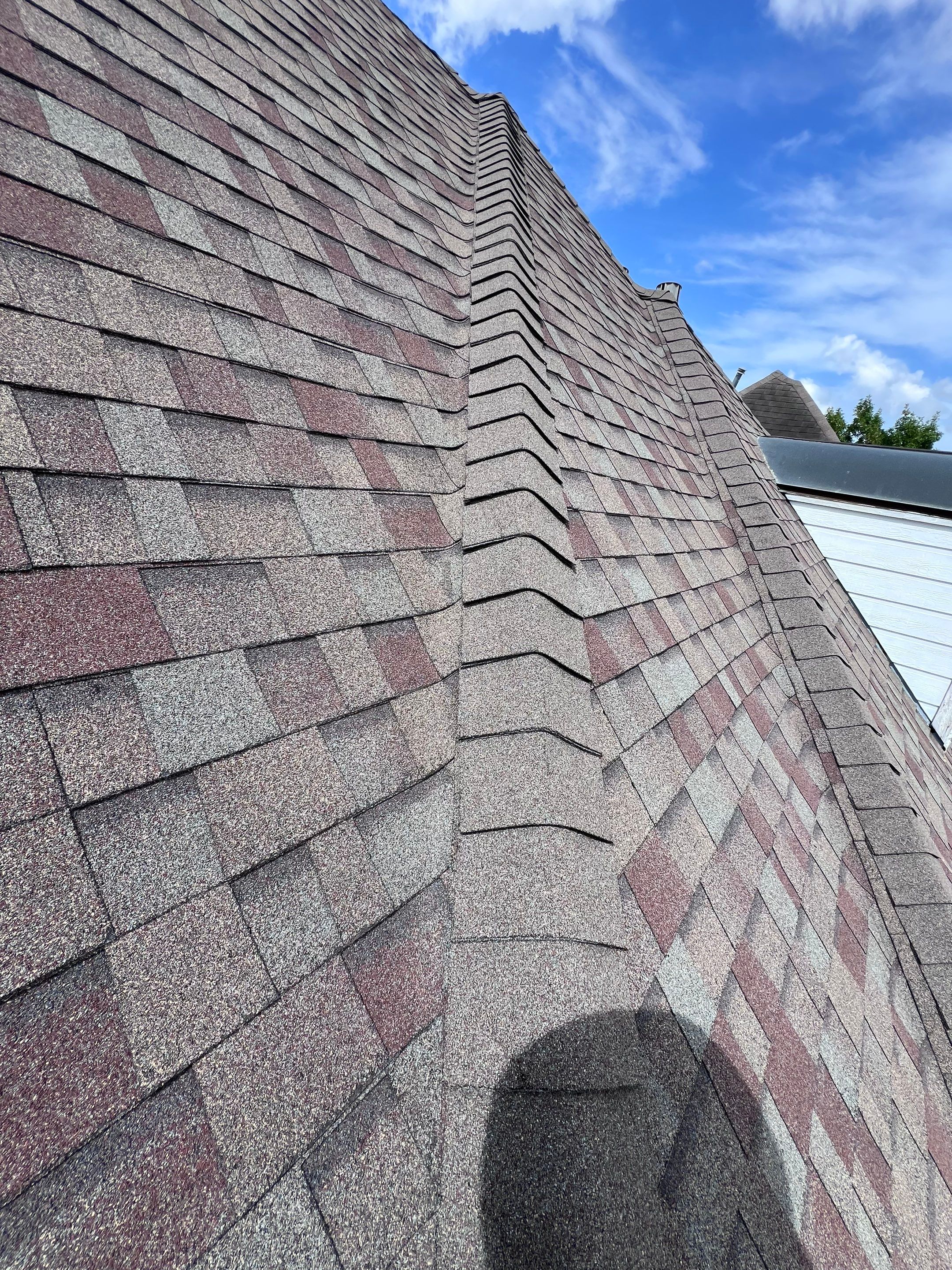 Hail Damage using Owen's Corning Duration (Lifetime) Shingles by Roof Repair Company