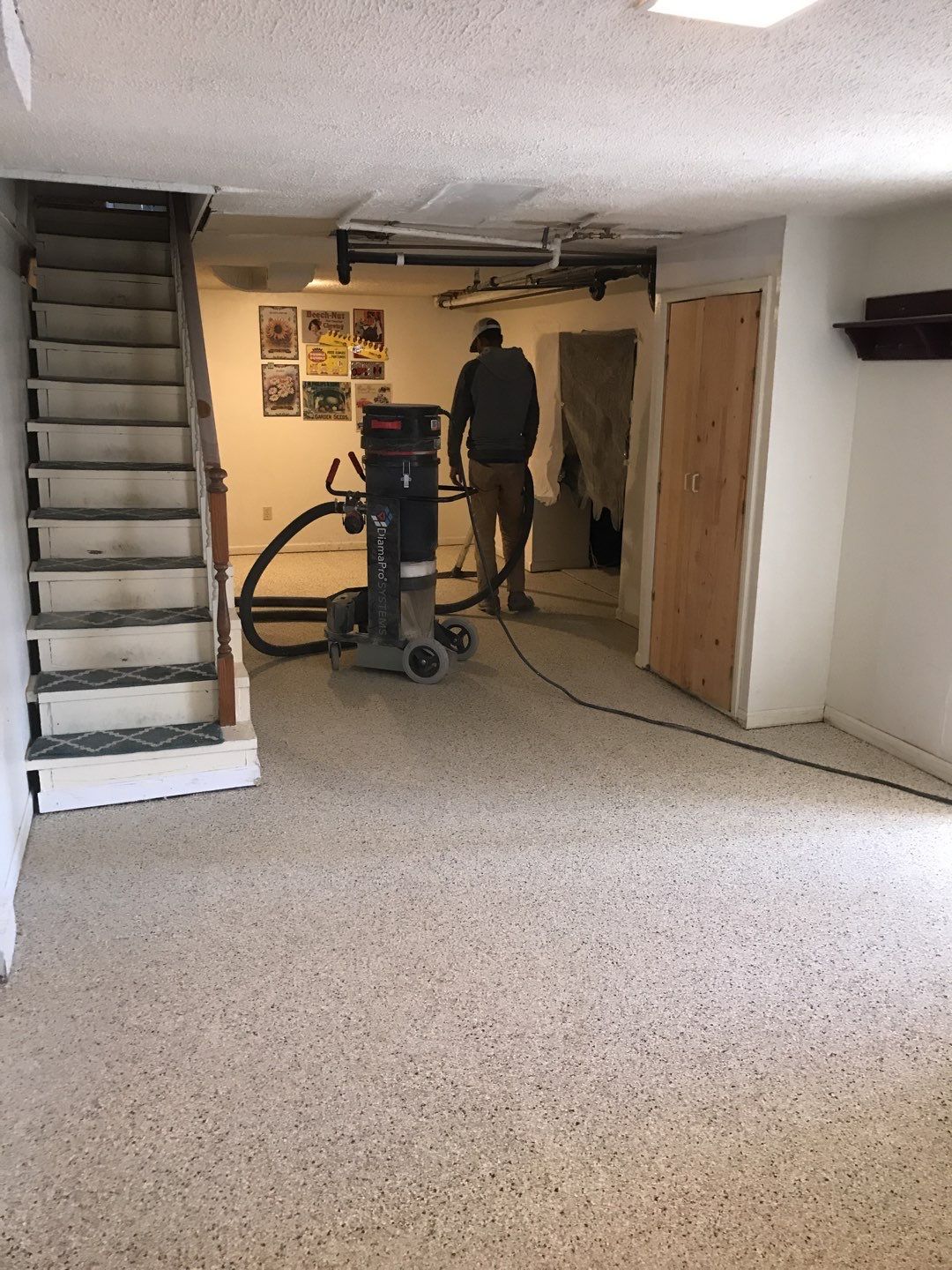 Basement using Driftwood by Select Painting, Coatings & Garage Cabinets