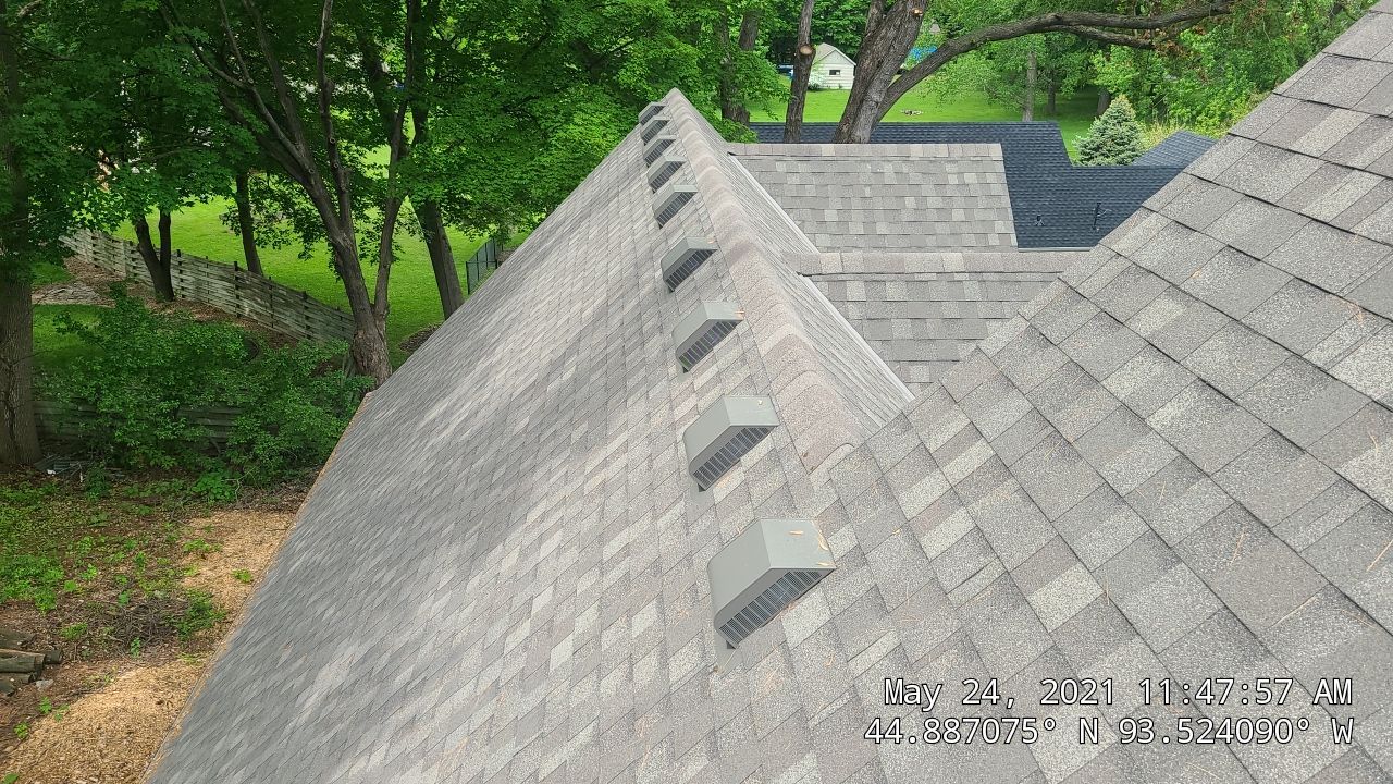 Chanhassen, MN – Roof Replacement with Gutter Guard Upgrade by First Impressions Exteriors