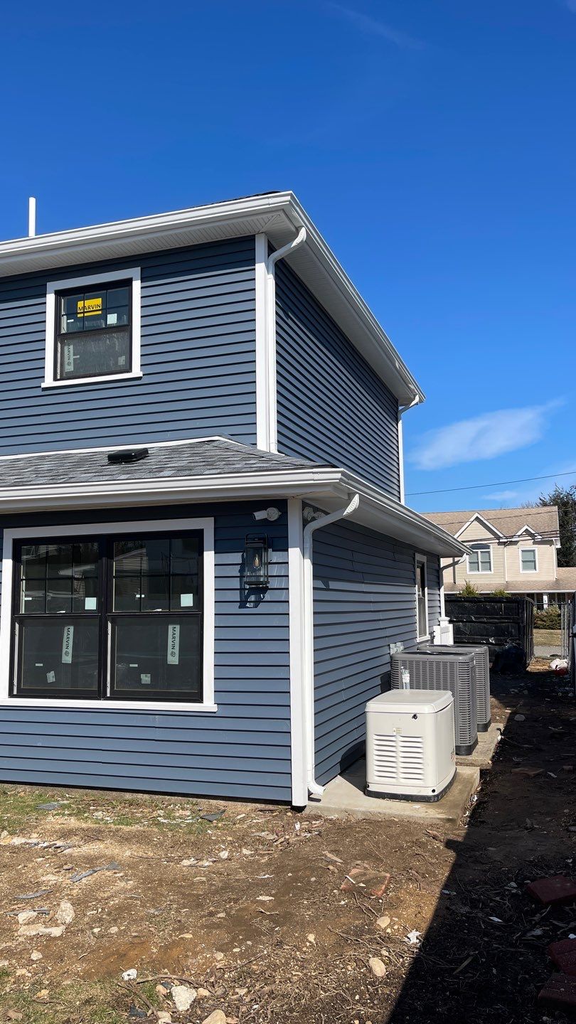 Full House Installation 5" white seamless gutters 2x3 leaders by Above All Gutters 