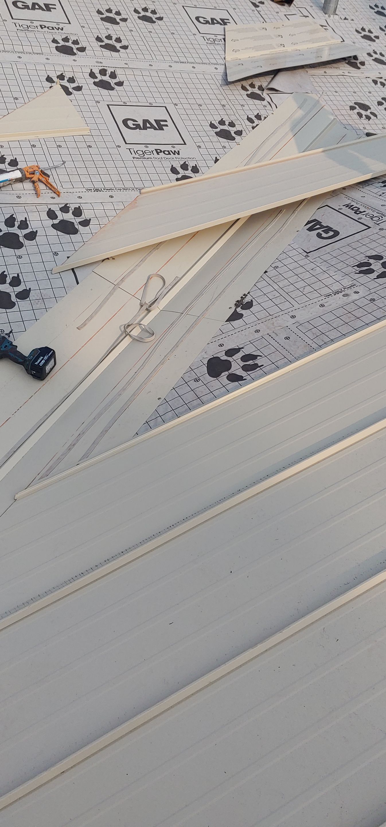 Residential Roofing Installation using Standing seam metal roofing system by Straight Edge Roofing Inc