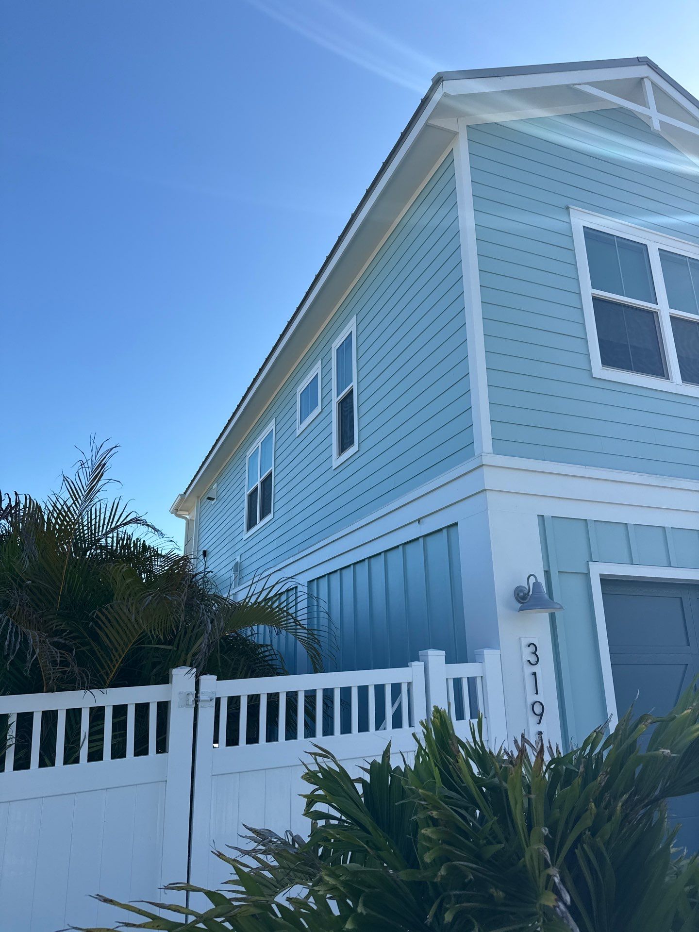 New White Seamless Gutters Installation and Downspouts, Reseal Gutters in Fort Myers Beach, FL  by Gutter Professors