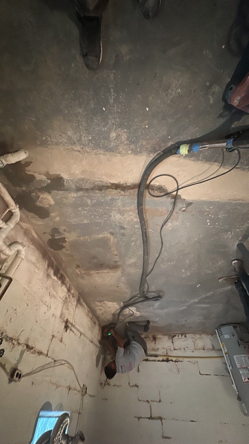 Basement, Bar & Laundry area  by Floors in a Day, Inc