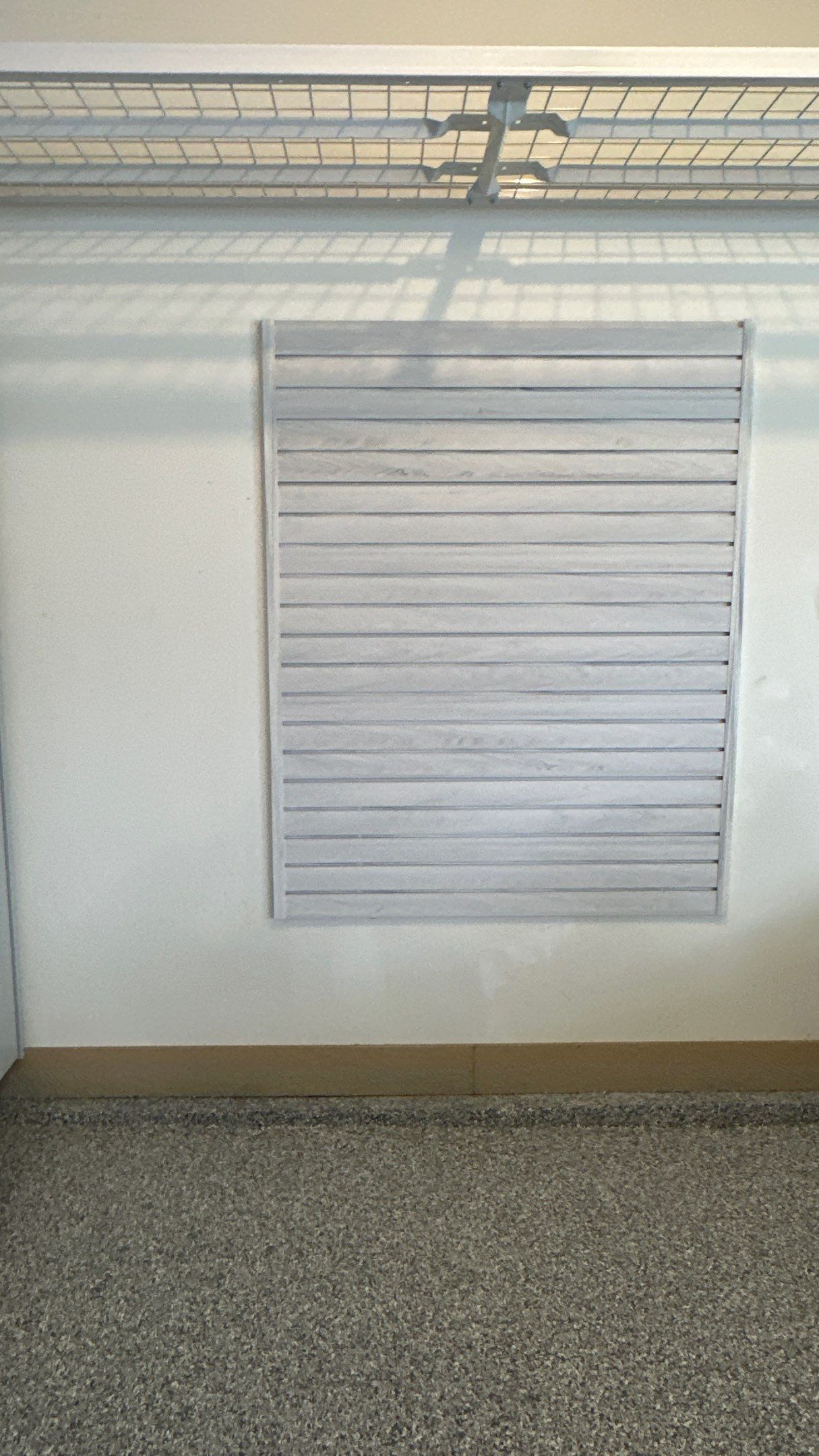 Carly U chose platinum powder coating for her cabinets by Banner Garage