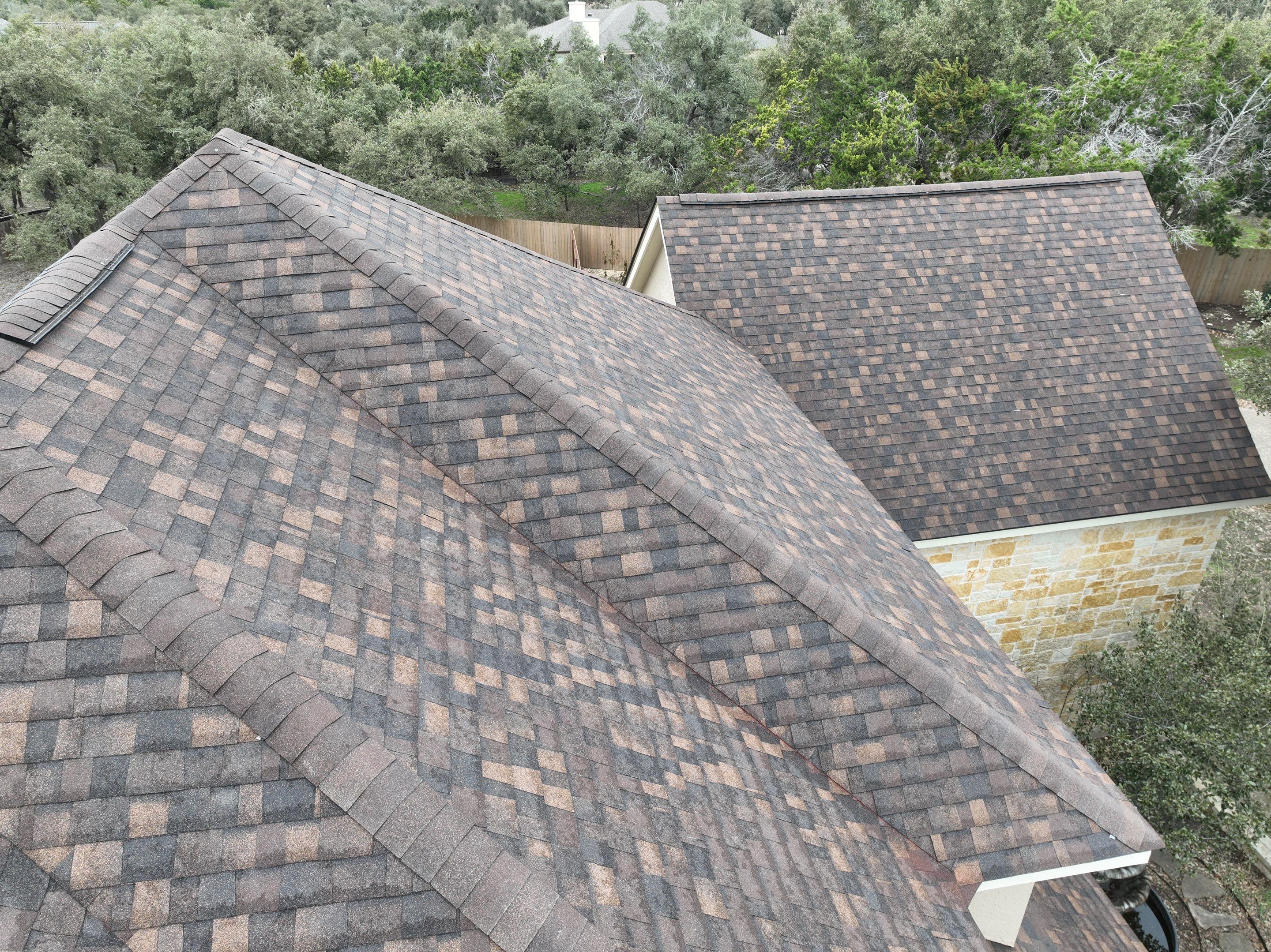 Residential Roof Replacement using 30 Year Laminate Shingles with High Profile Ridge by Premier Roofing and Contracting