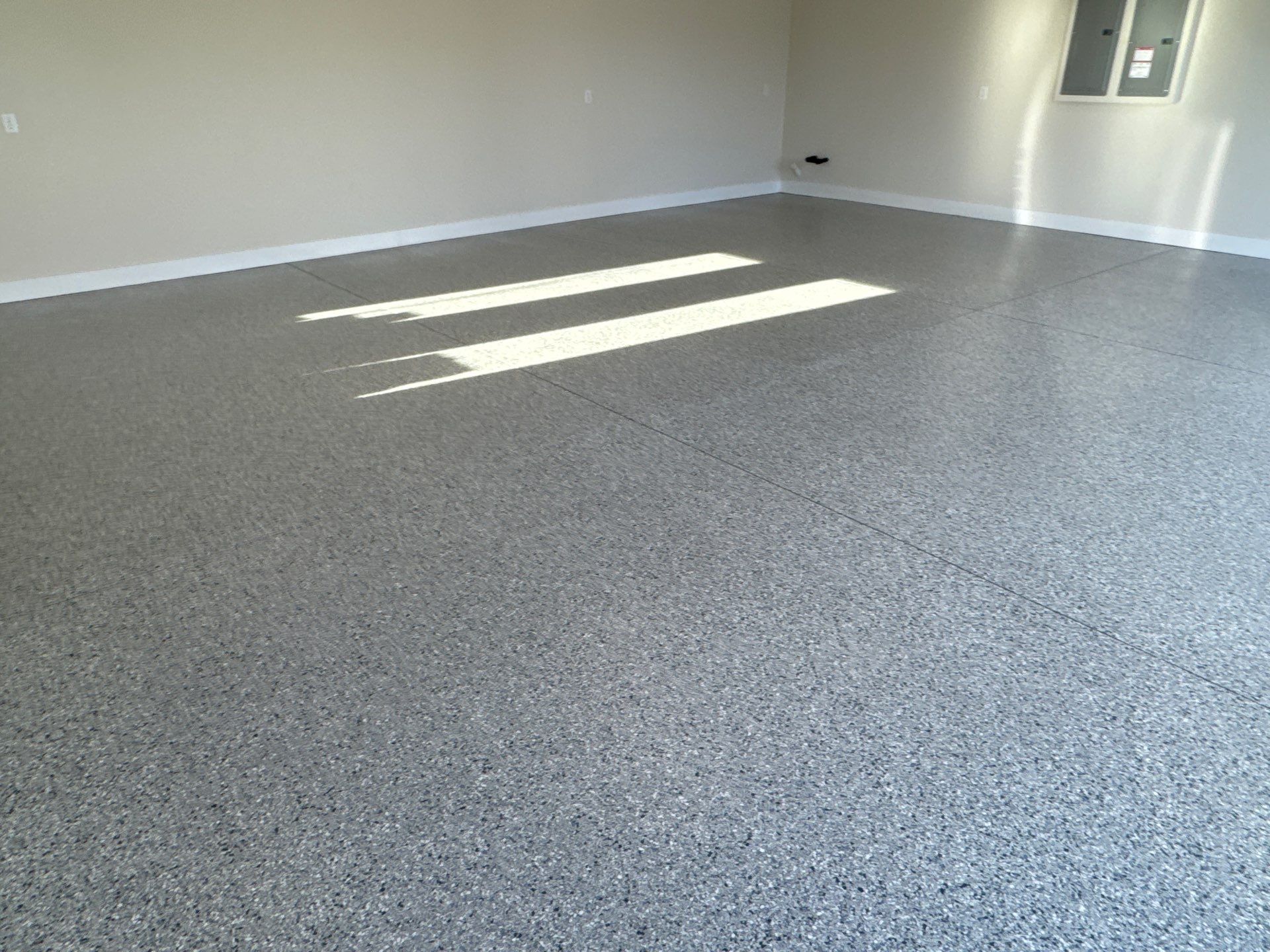 Garage in Tidal Wave by Cross Creek Concrete Coatings