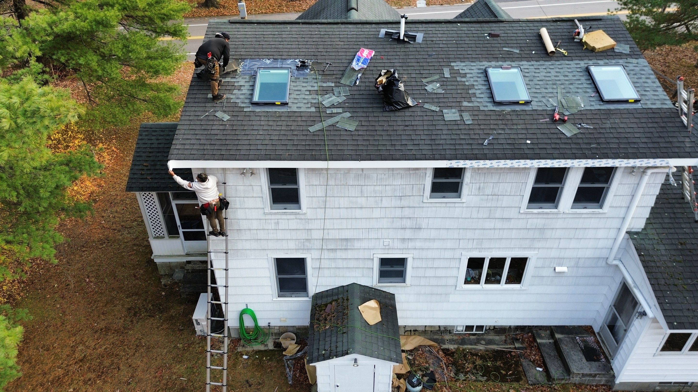 Chelmsford Triple Skylight Leak Repair with Fascia & Shingle Restoration by Mighty Dog Roofing of Greater Middlesex County