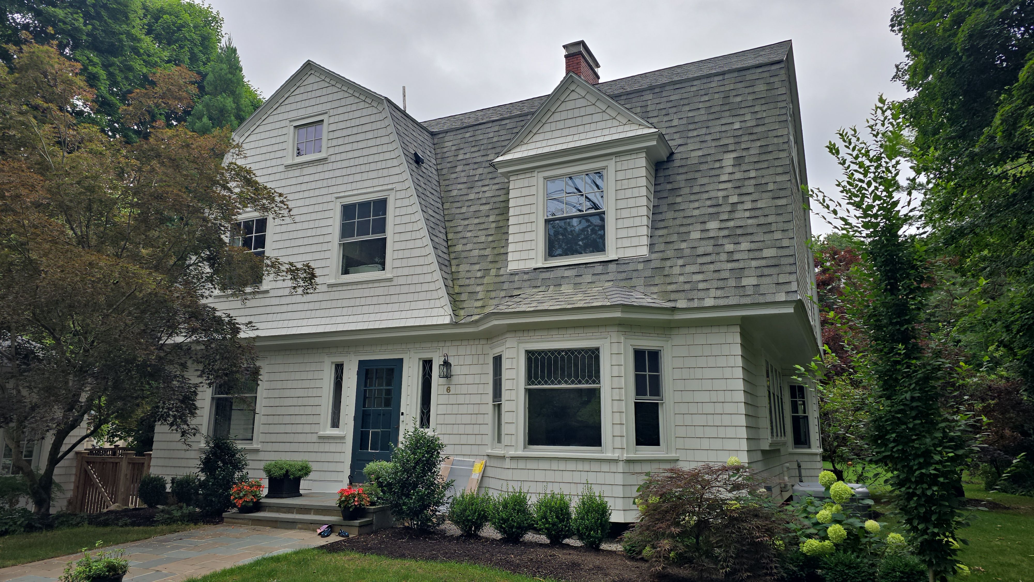 White cedar shingles and windows in Wayland, MA by UBrothers Construction