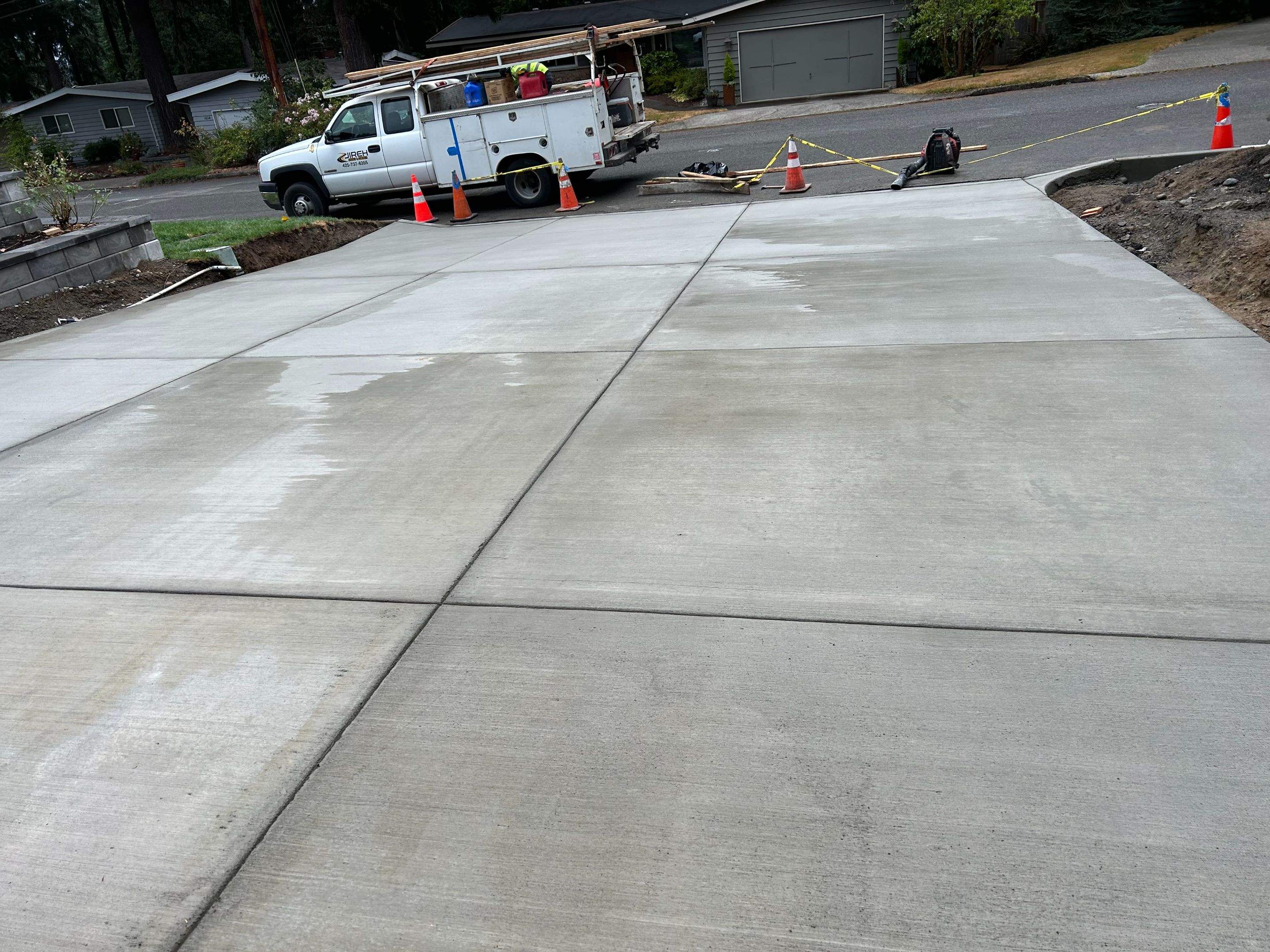 Bruce | Broom Finish Driveway, Concrete Project by Jireh Asphalt & Concrete Inc 