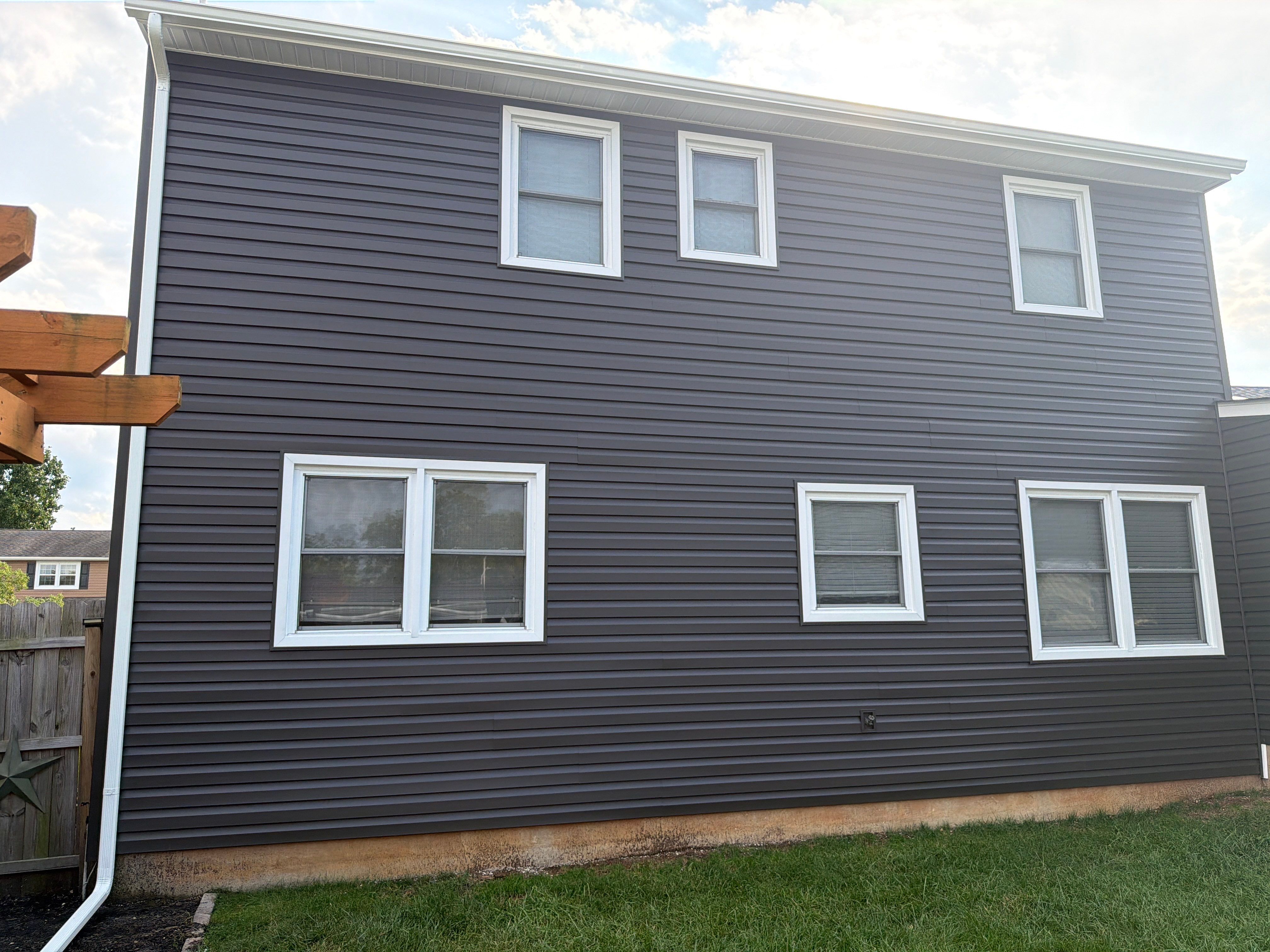 Fairless Hills Exterior Remodel with GAF Roofing and Charcoal Vinyl Siding by Stofan Construction LLC