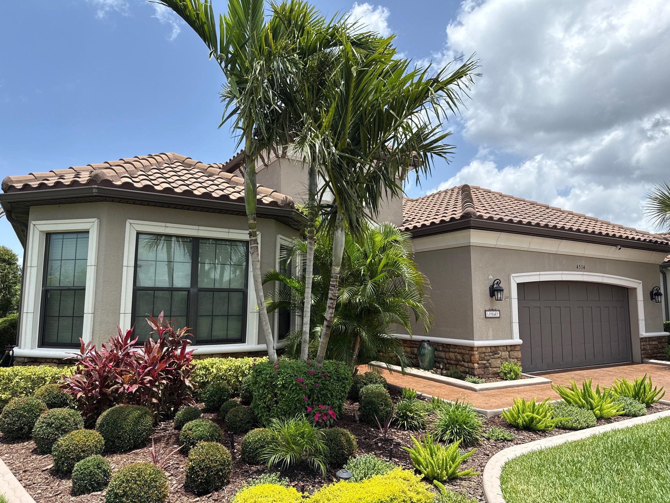 Neighboring Tile Roof Cleaning with Gutter Runoff Control – Palmetto, FL by Sunshine AquaWash