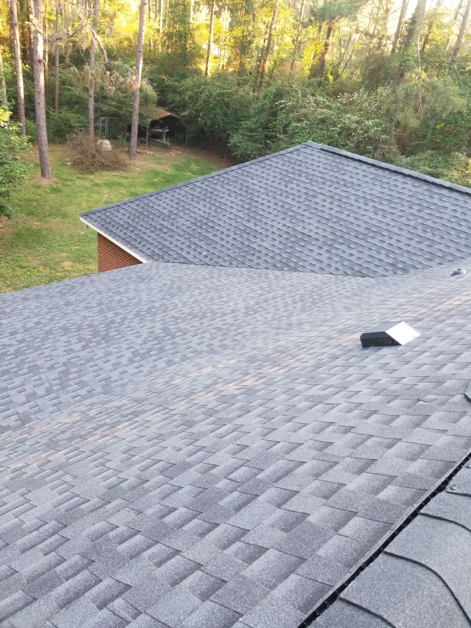 Residential Roofing Installation using Roof Replacement by American Roofing & Construction LLC