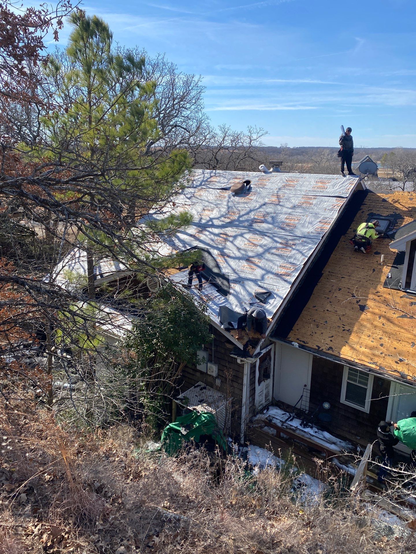 Roof Replacement on a private lake near Ardmore by BANA Roofing and Solar Supply