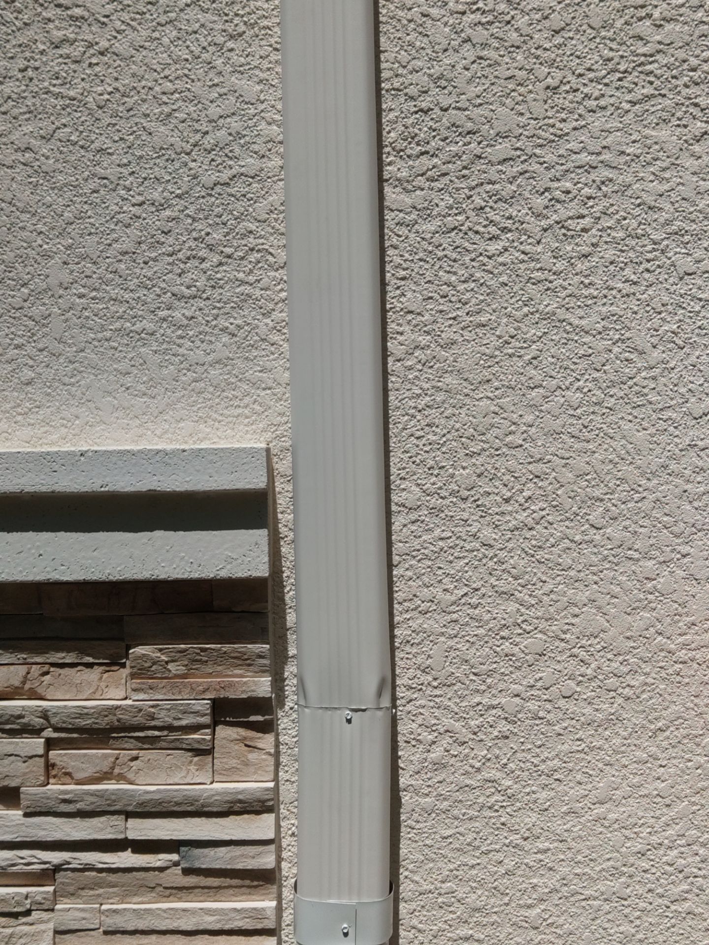 Bronze Gutters and Almond Downspouts in Longboat Key FL by Gutter Professors