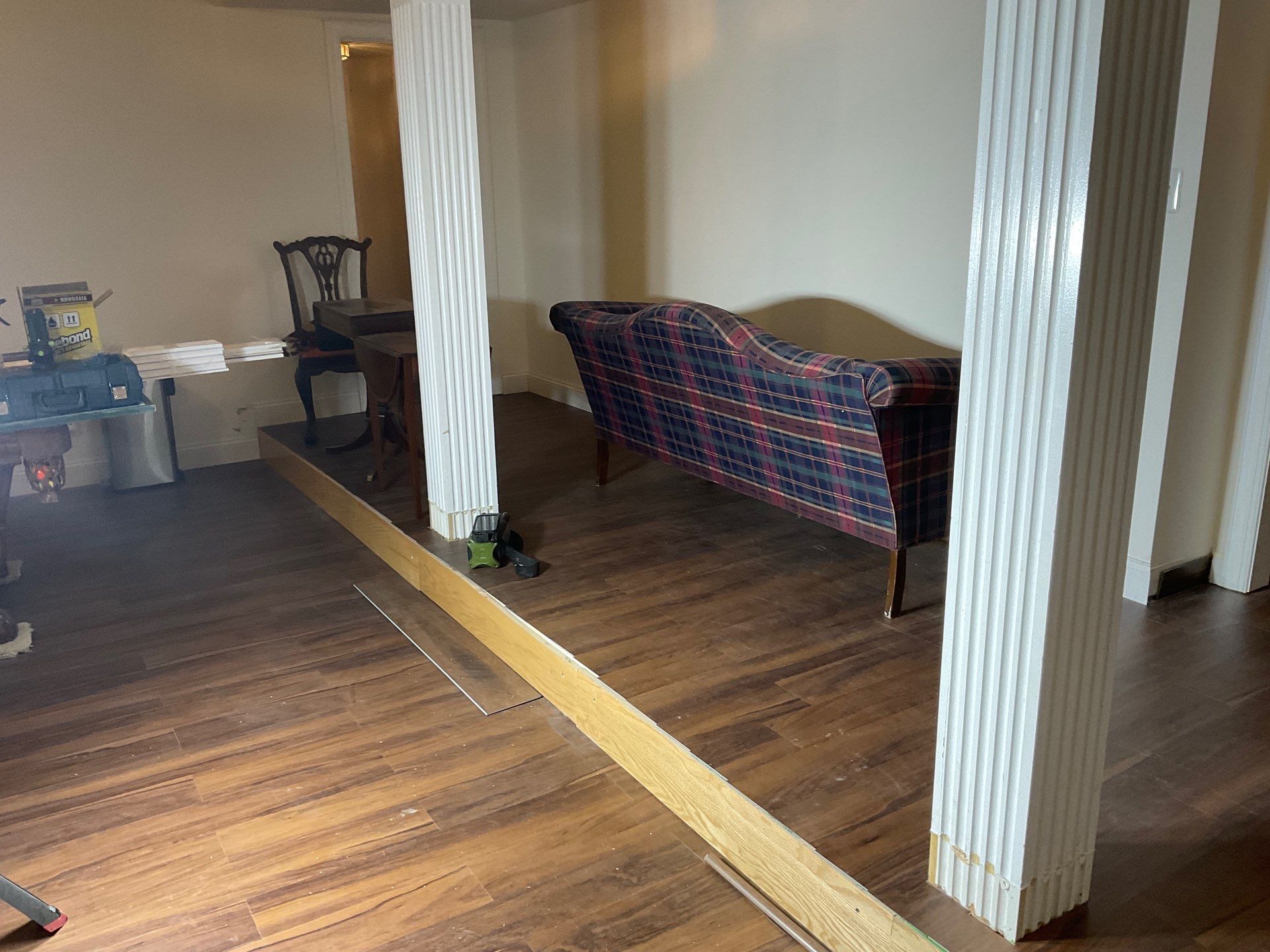 New Gutters, New Floor, New steps, New Paint job by Alpha Design Services