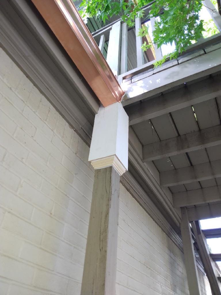 Gutter Installation using Pure Copper Seamless Rain Gutter System by Harvey Roofing & Construction