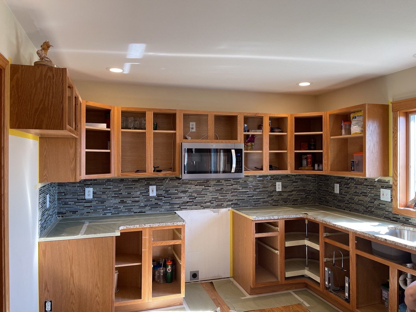 Kitchen cabinet repaint by Cutting edge painting 