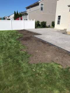Stamped Concrete, Entry Door, and Concrete  by Ivy Lea Construction