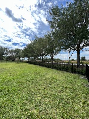 Aluminum Fence Installation using Black 3 Rail Aluminum Fence