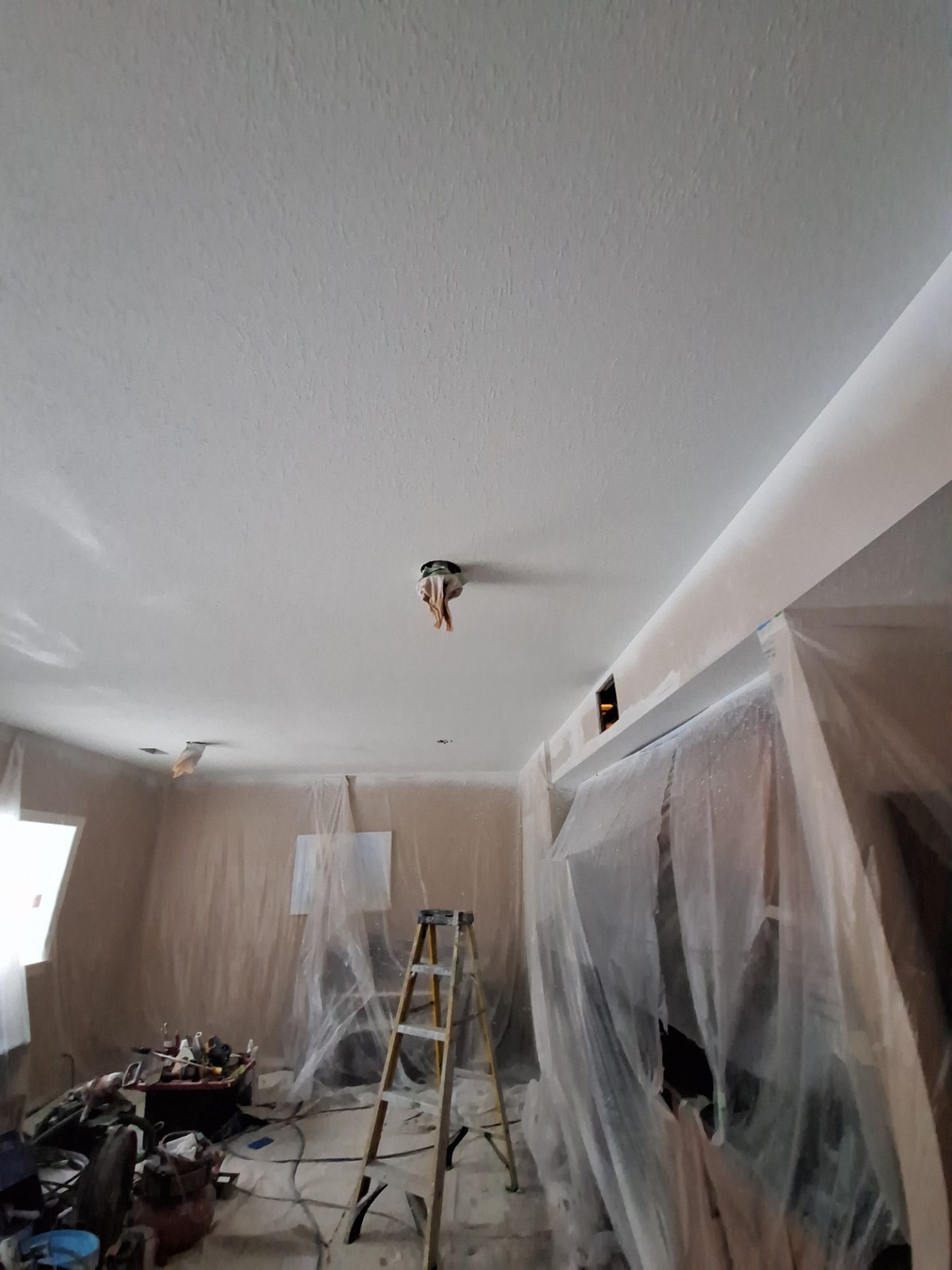 Basement Ceiling & Wall Repair + Interior Painting in Grand Haven, Michigan by Gordon Painting
