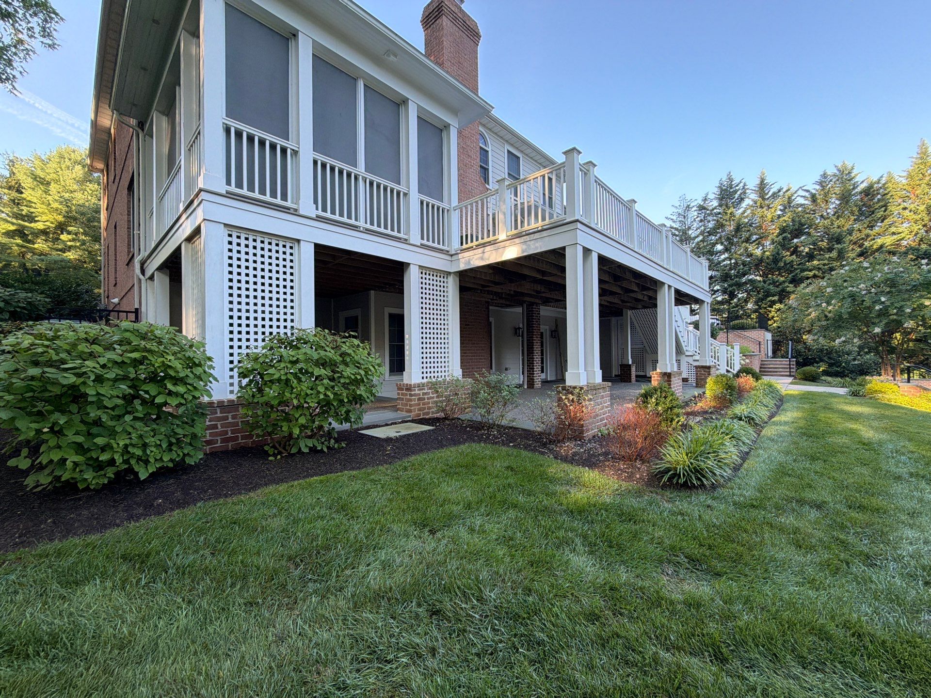 Composite Deck and Stone Paver Walkway power washing. by Baltimore Pressure Washers Inc.