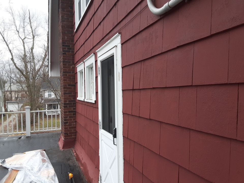Residential Roof Replacement using Patio Roof by Absolute Roofing and Construction