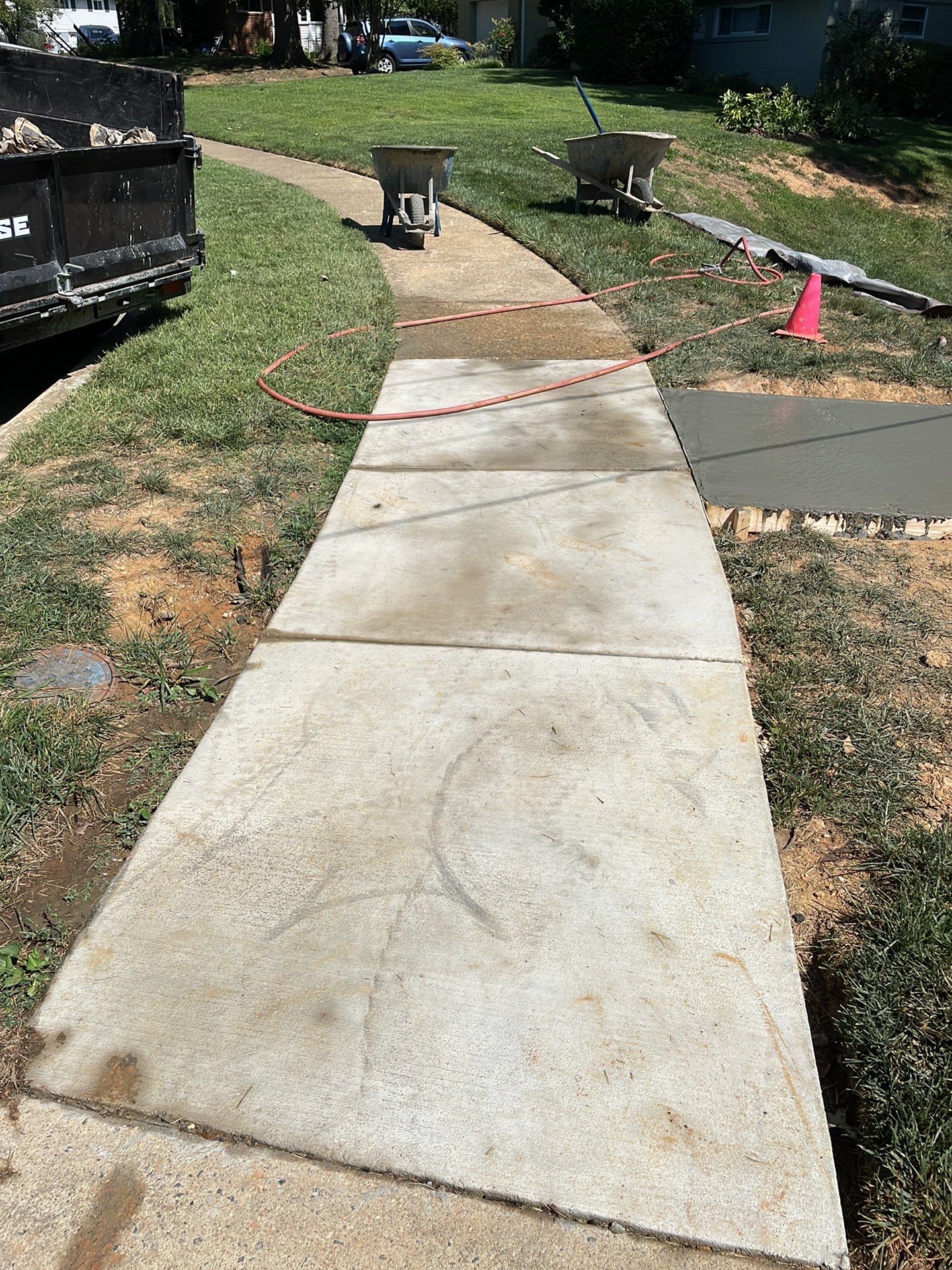 New walkway with stairs and a new front porch by Fairfax Contractors, LLC