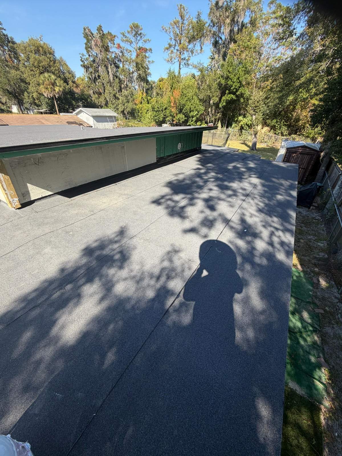 Flat Roof Renovation Due to Water Accumulation by urban green energy llc