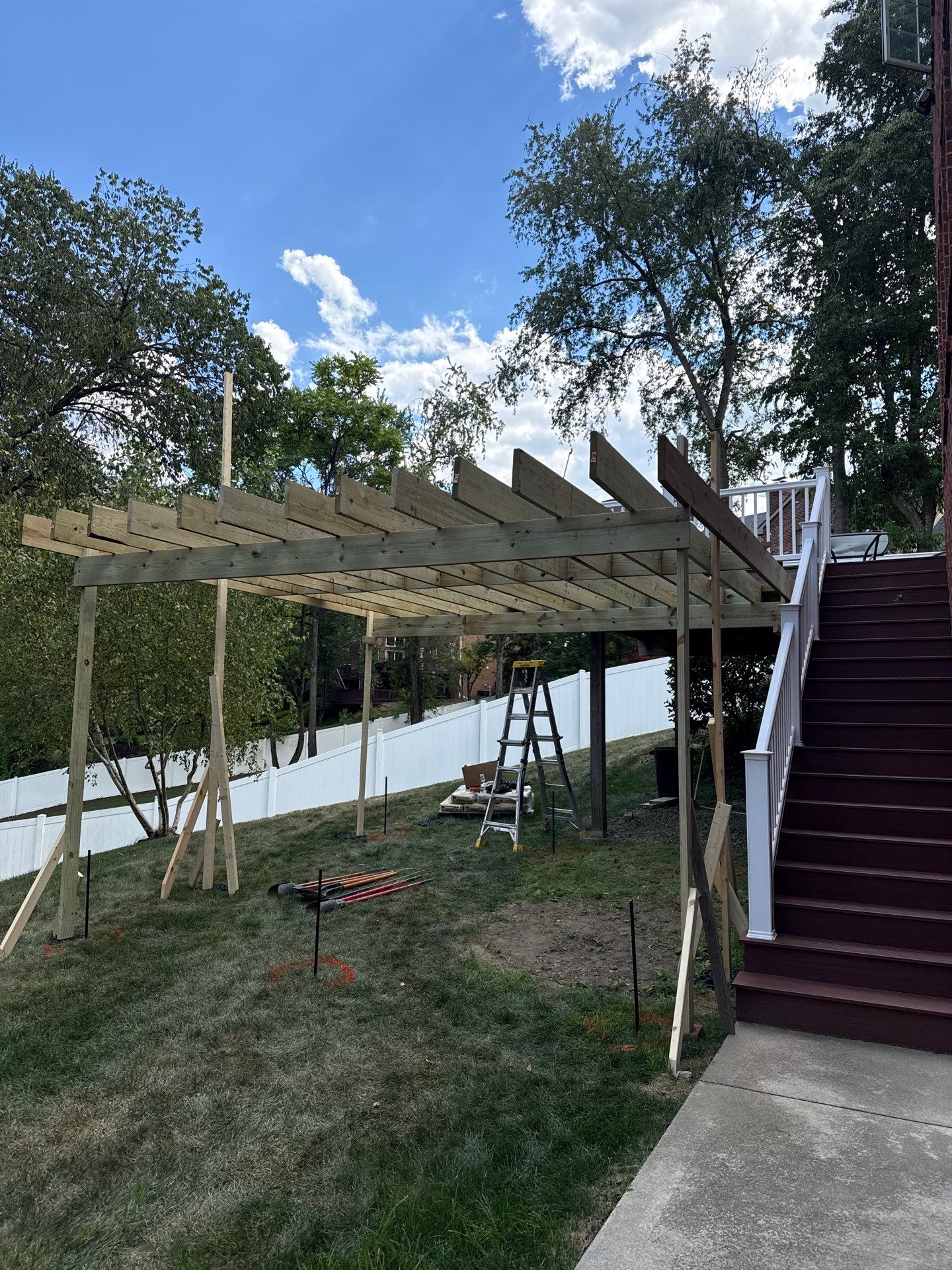 Deck extension  by Cousins Roofing Siding & Decks