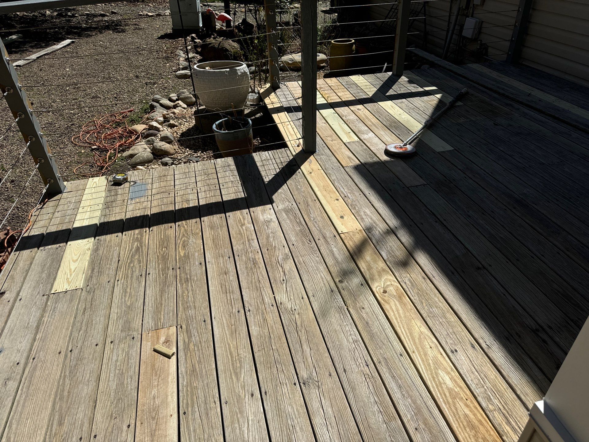 Deck staining by GonzalezPainters & Contractors Inc 