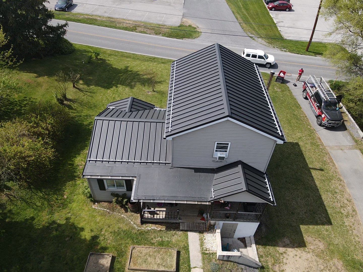 Residential Roofing Installation using Texture Standing Seam by Teflon Roofing