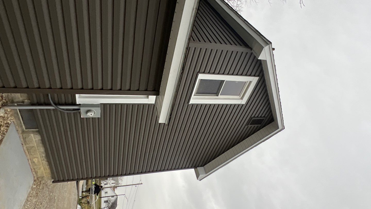 Residential fascia replacement using Exterior Portfolio 4.5 DL - Peppercorn by Nitro Roofing and Construction