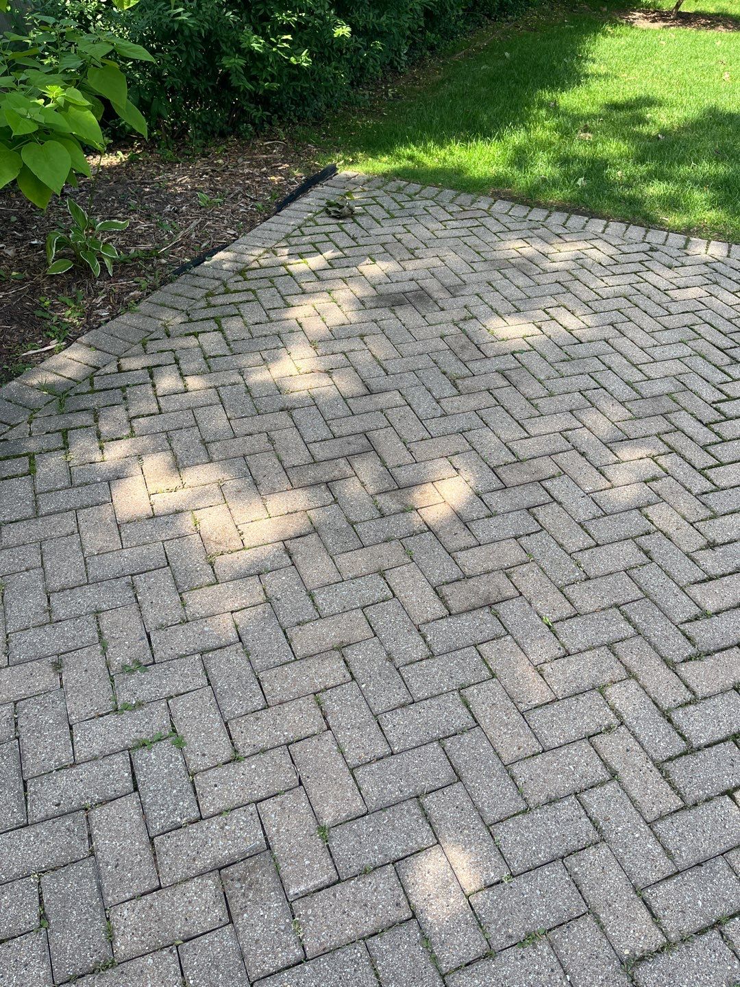 Brick paver repair, cleaning and sealing by Northern Power Washing LLC.