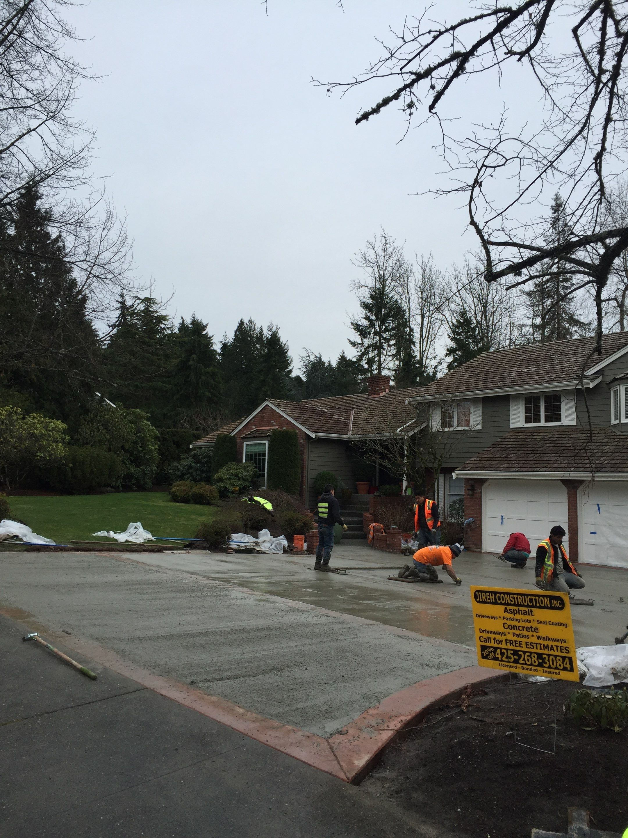 Custom Aggregate Driveway and Stamped Finish  by Jireh Asphalt & Concrete Inc 
