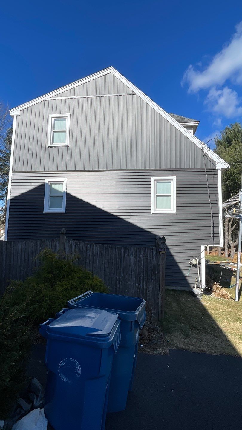 Complete Exterior Renovation with New Siding & Gutters   by Sensible Home Solutions