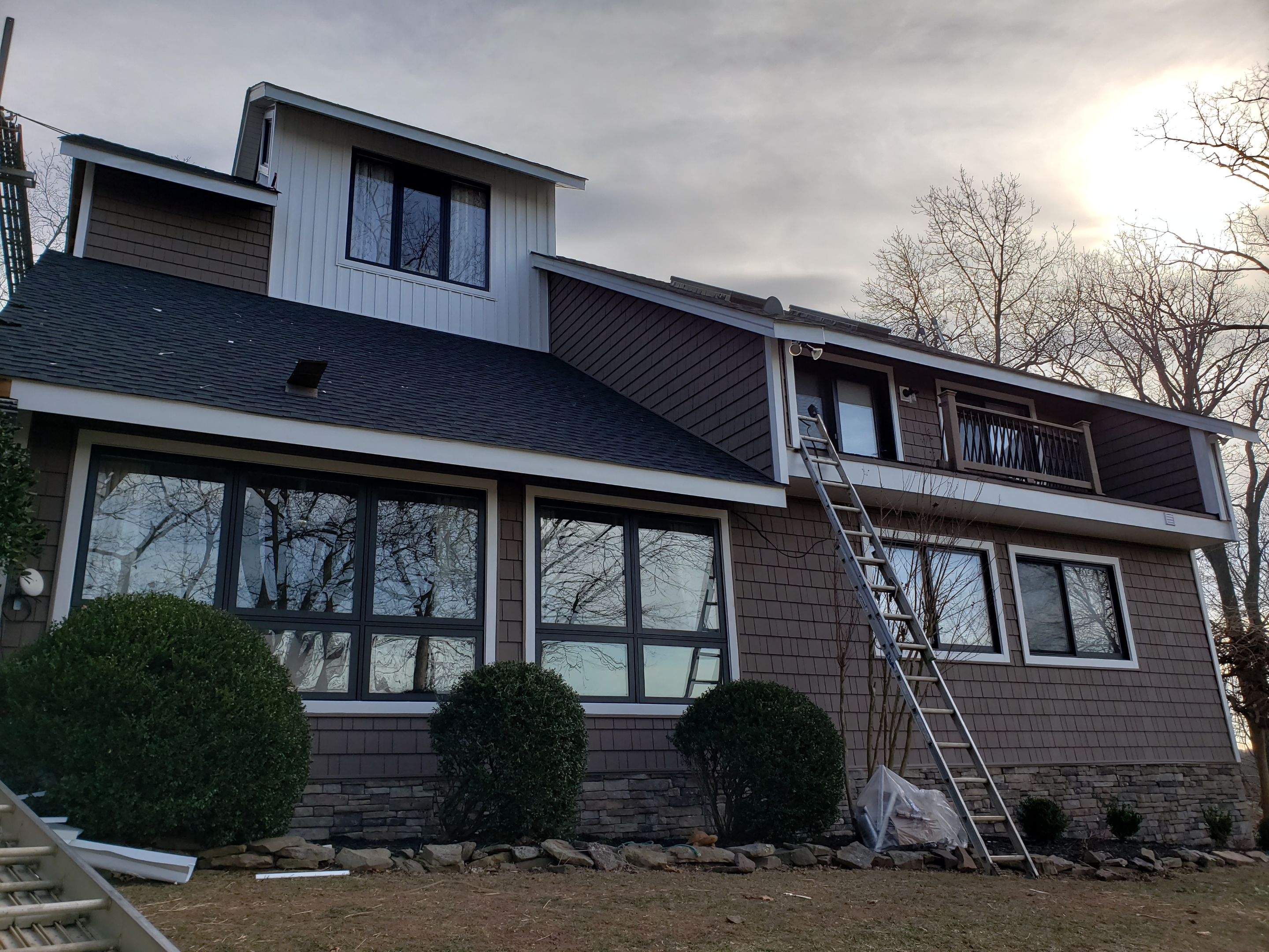 Roof, Siding, Soffit, Trim, and Gutter replacement by American Home Contractors