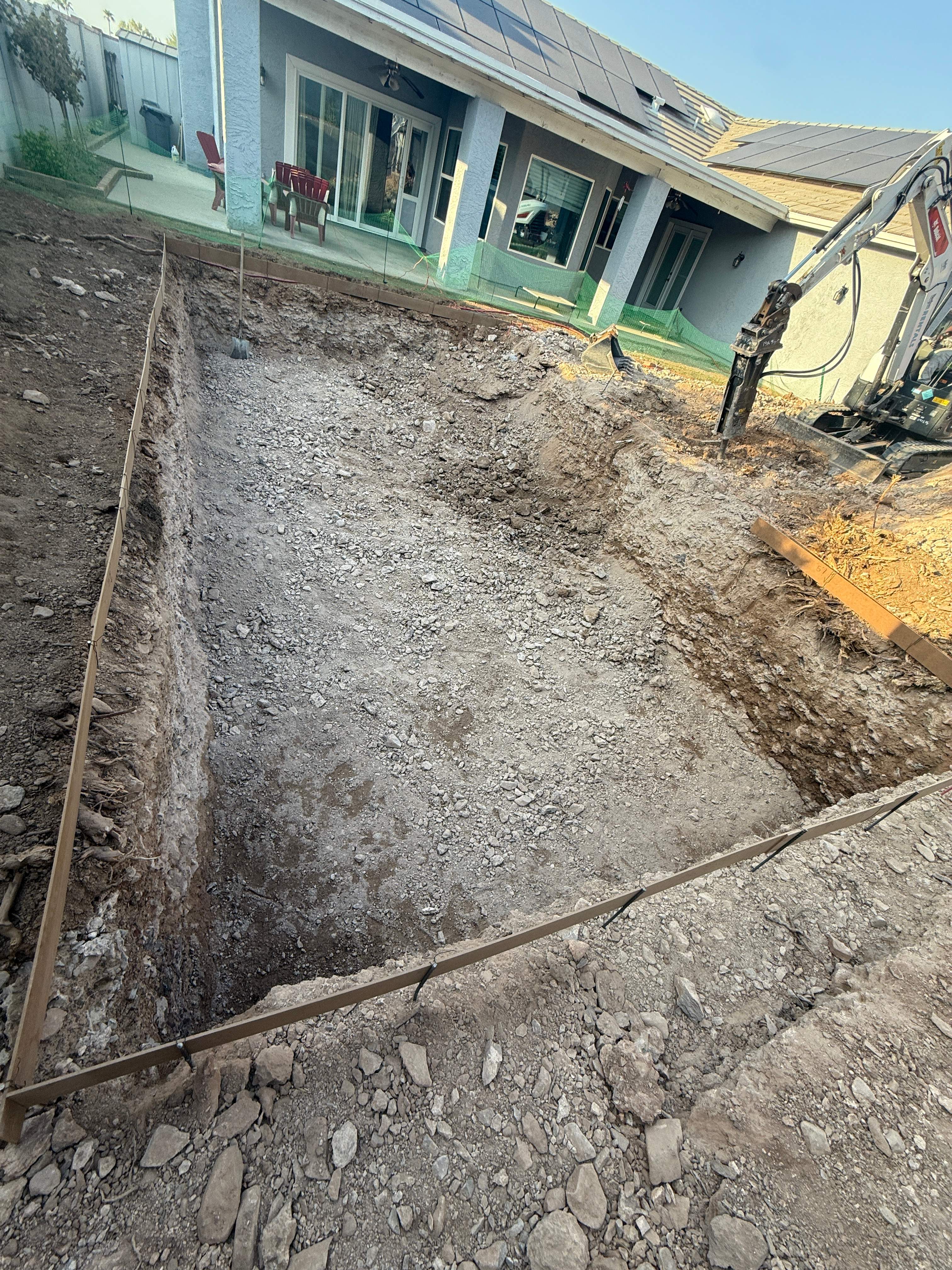 Pool build with baja step and pebble finish by Modern Pools
