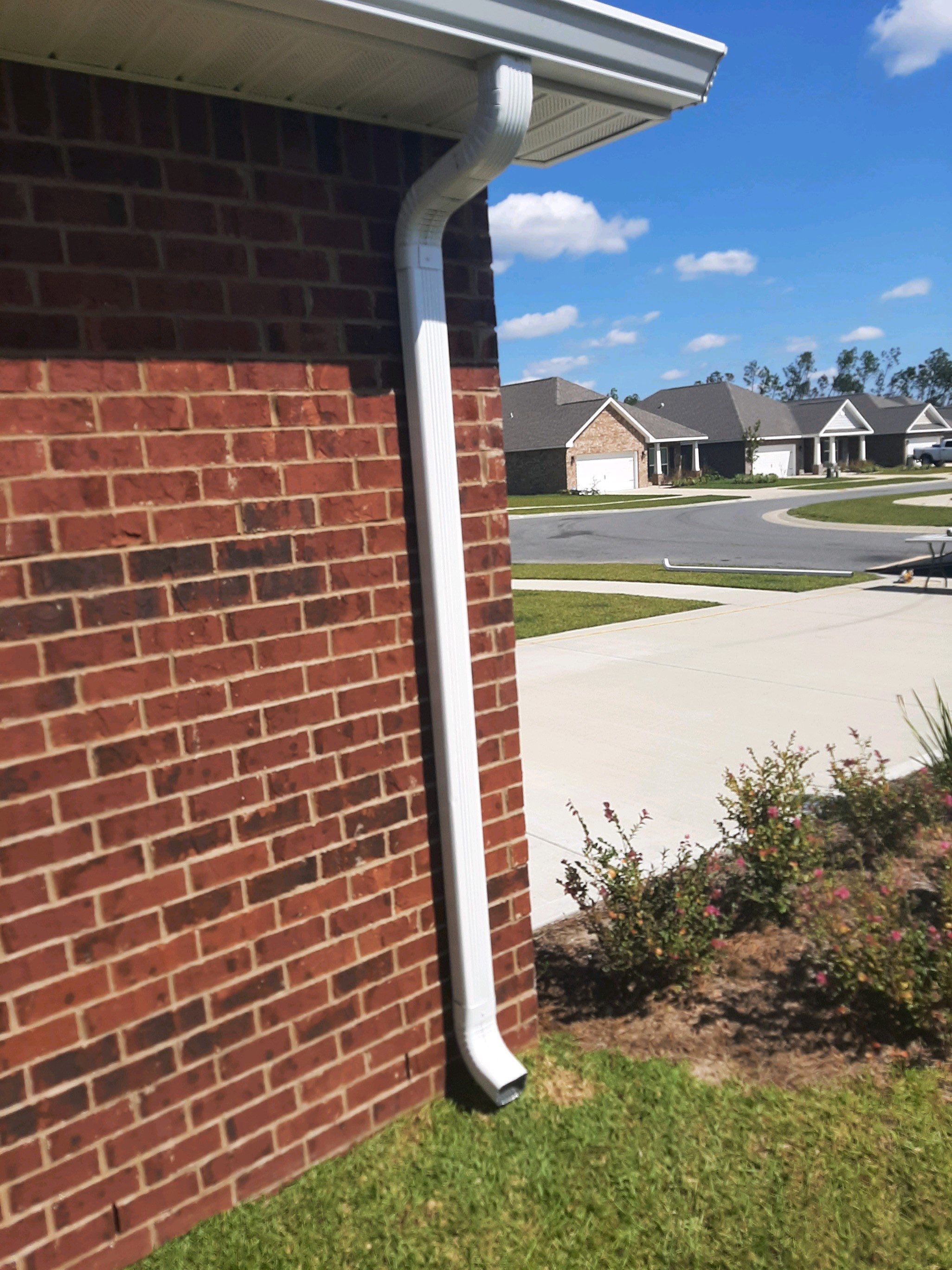 Seamless Gutter Installation using White K-Style Gutters by Gutter Professors