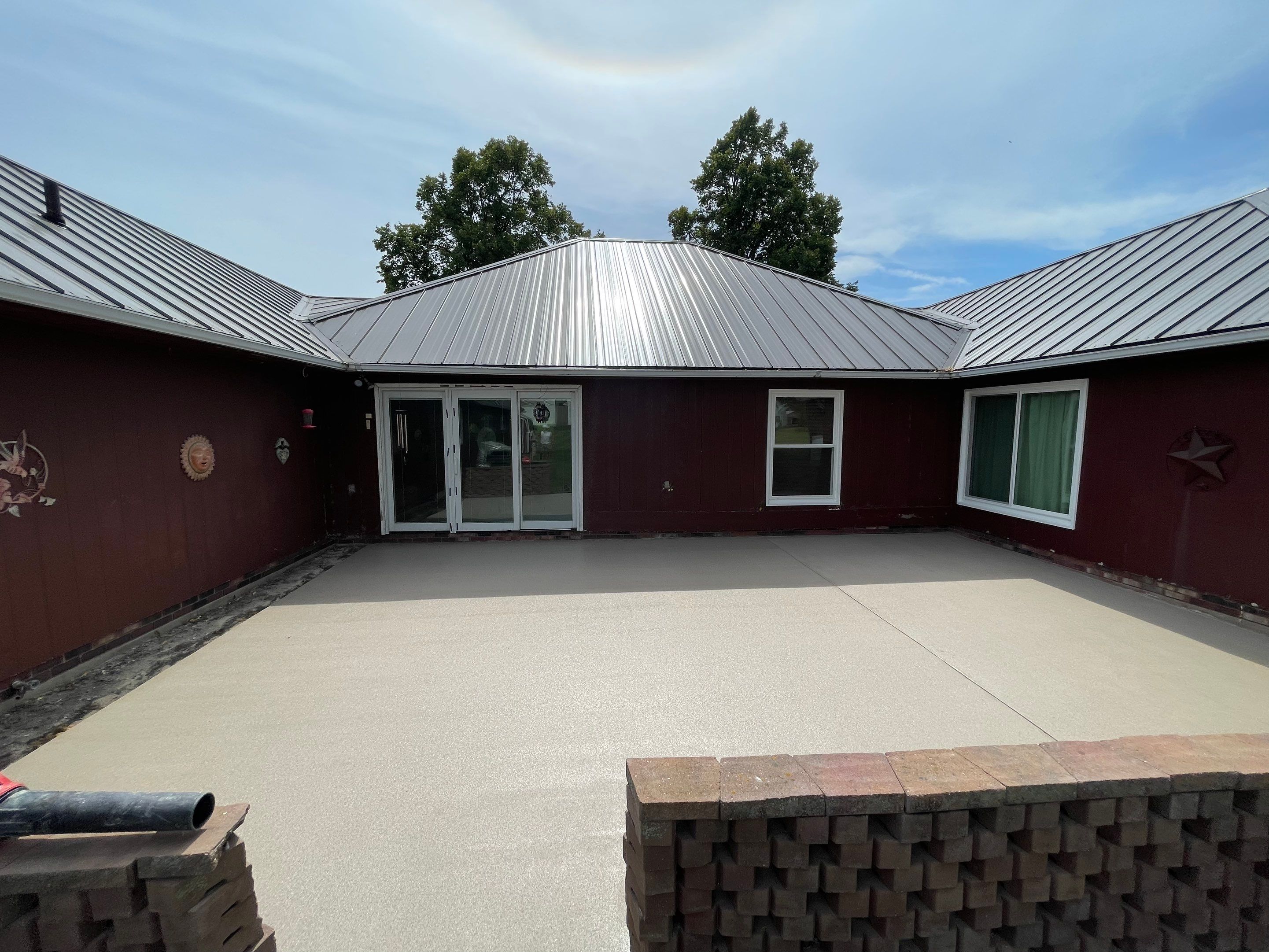 Concrete Patio Resurfacing and Protective Coating in Winfred, South Dakota by Select Painting, Coatings & Garage Cabinets