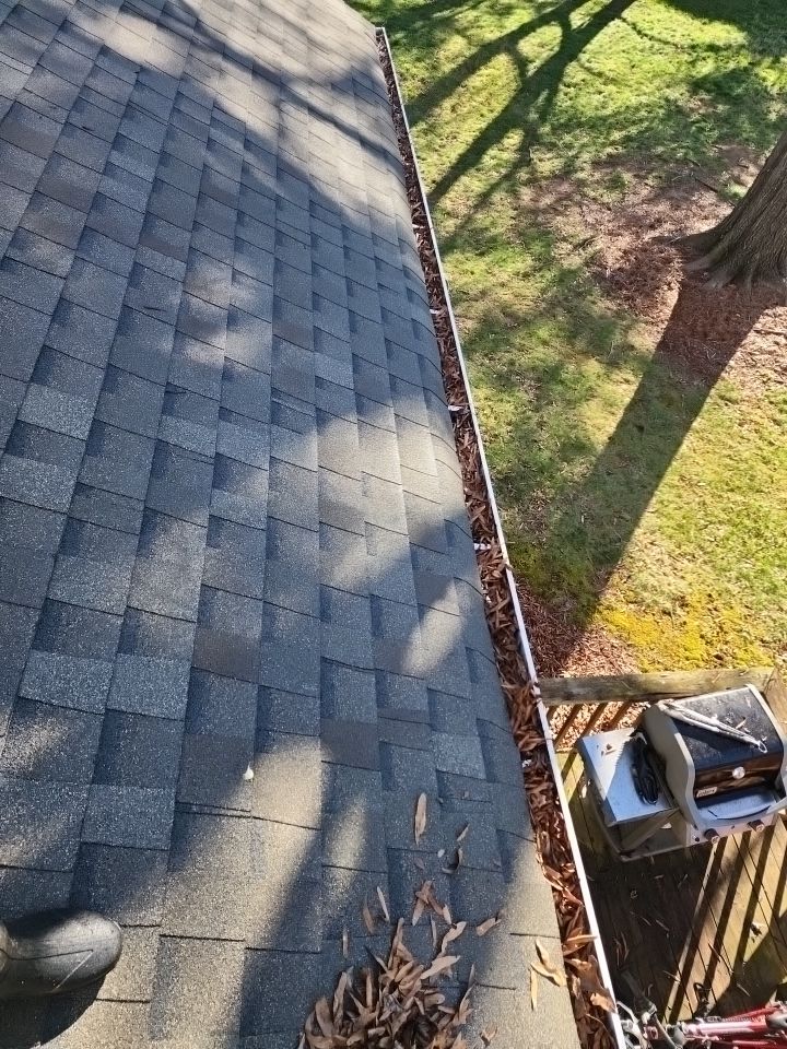 Gutter Cleaning using water by Power Wash Masters LLC