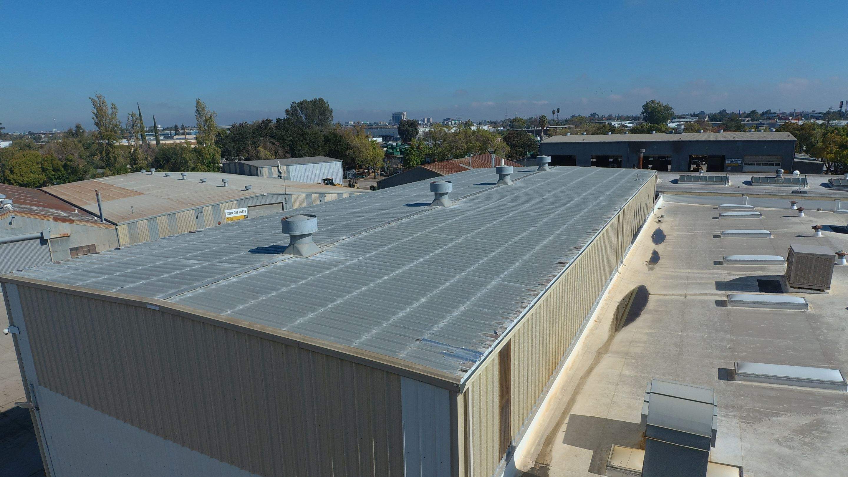 MR Roofing system using Conklin BenchPly system with PUMA top coat by Straight Edge Roofing Inc