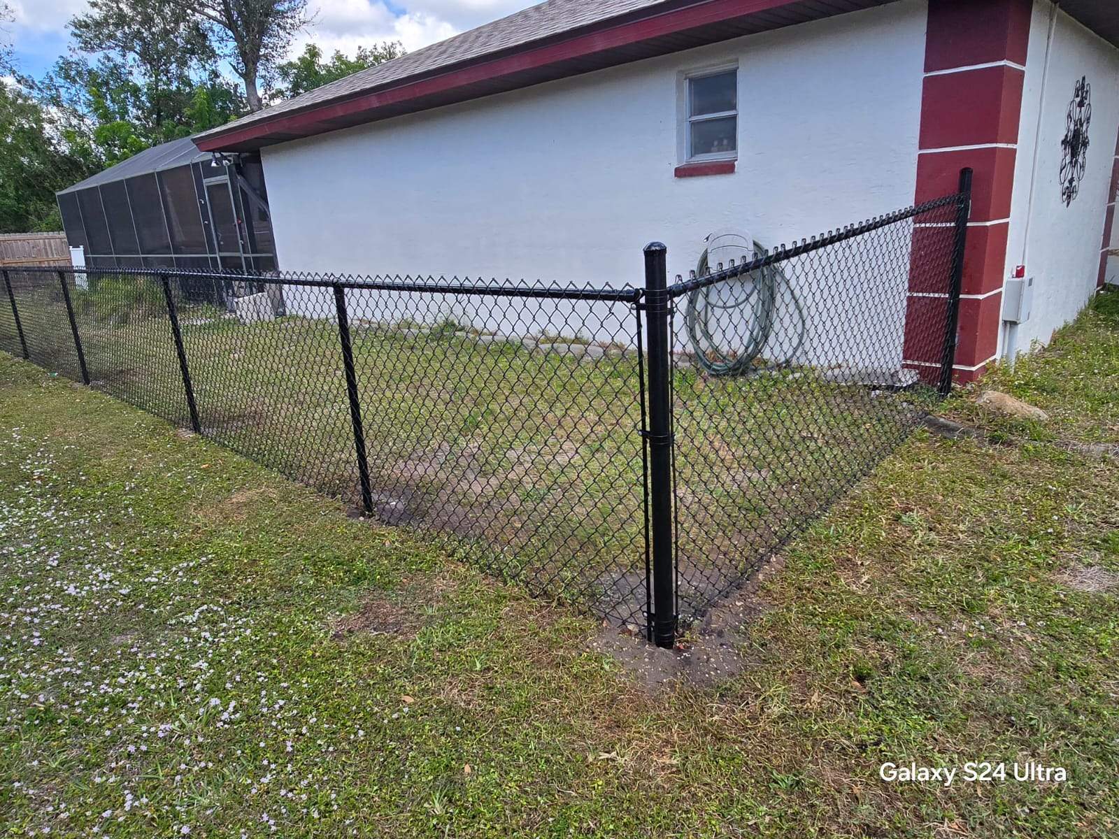Black Chain Link Fence Installation for Port Charlotte Residence by True Fence LLC
