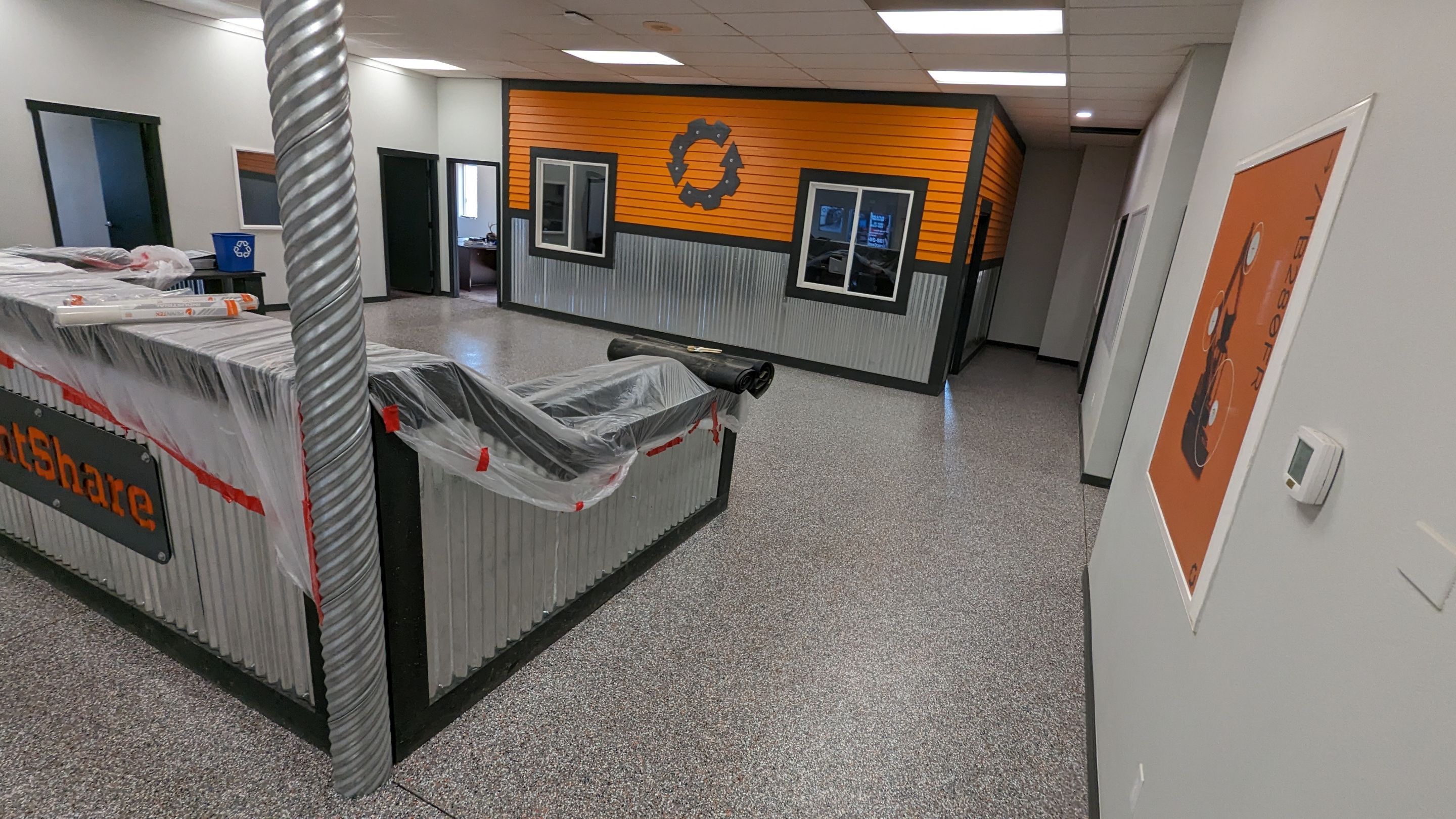 Equipment Share Commercial Floor Transformation using Smoke w/ 5% Orange by Croc Coatings, LLC